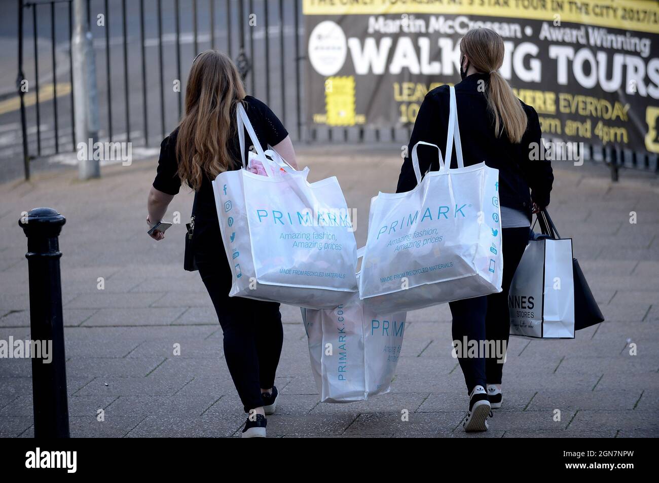 Shoppers with Primark bags in Derry, Londonderry, Northern Ireland. ©George Sweeney / Alamy Stock Photo Stock Photo