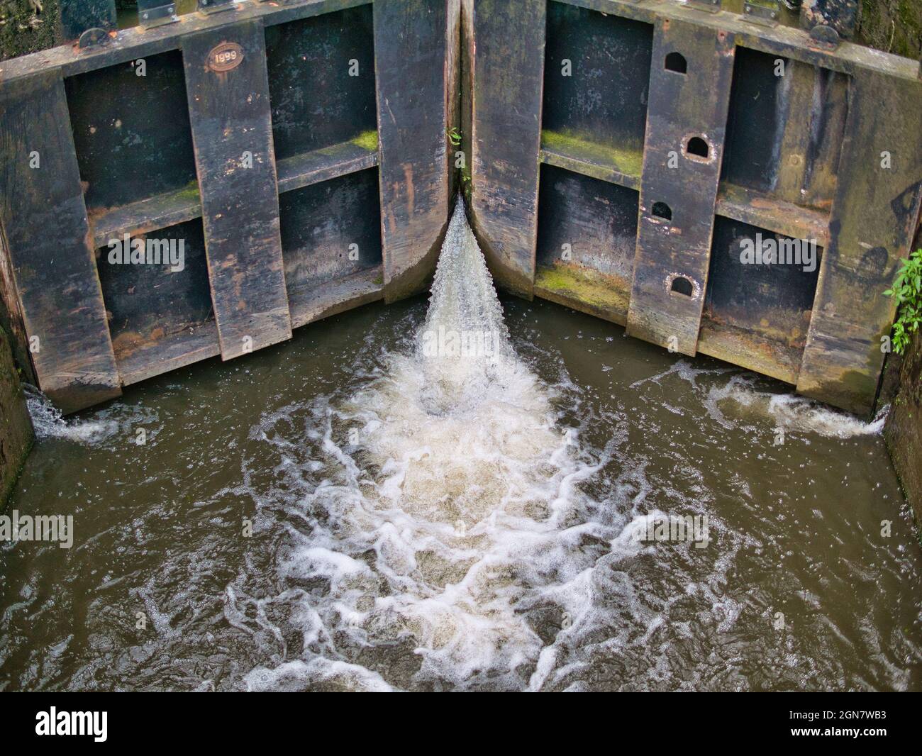 Gushing Water Leaking From Wooden Canal Lock Gates On The Leeds