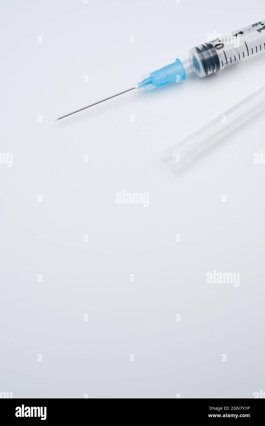 isolated sterilized injection syringe on a white background Stock Photo ...