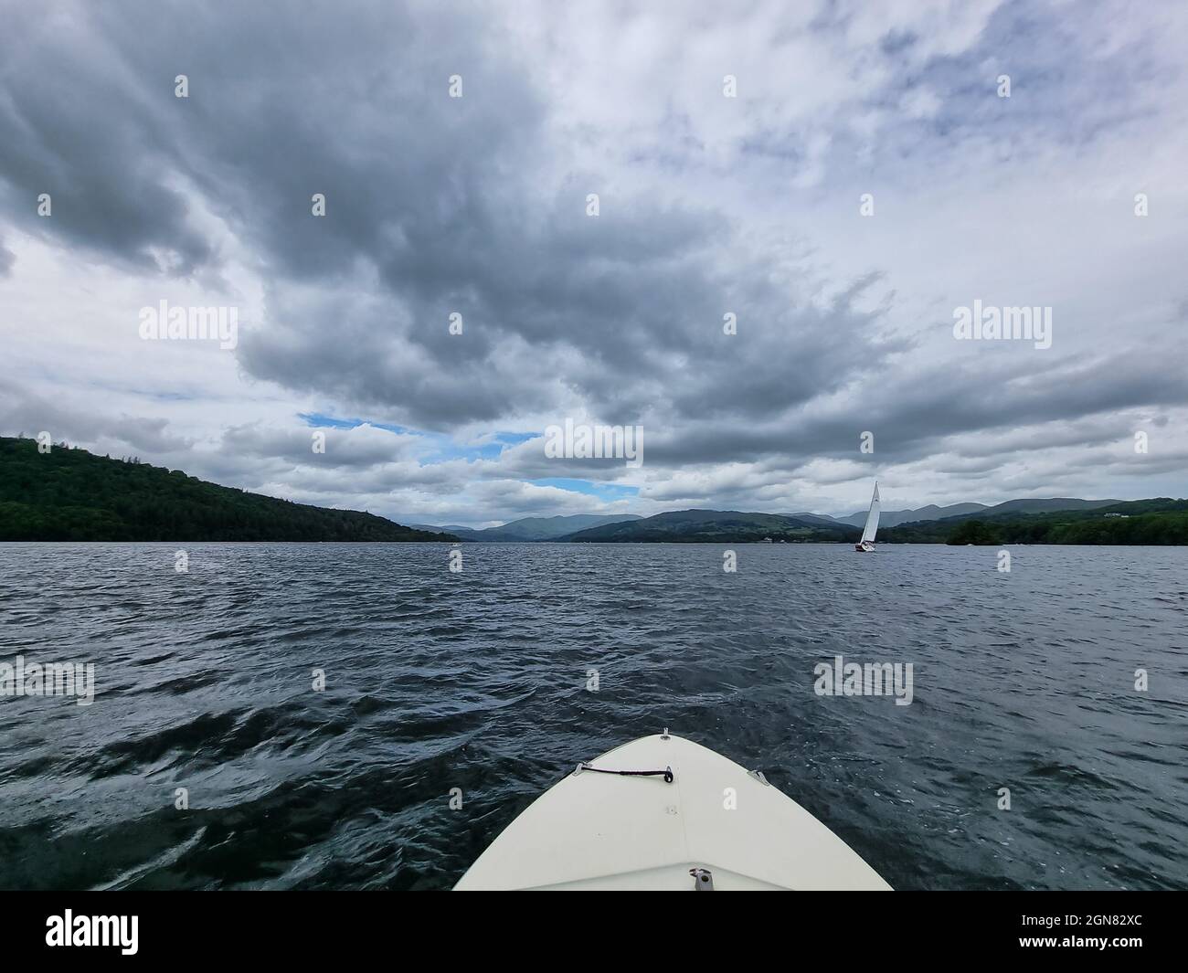 Picture Taken From A Small Boat On A Cloudy Day At Lake Windermere In picture-taken-from-a-small-boat-on-a-cloudy-day-at-lake-windermere-in