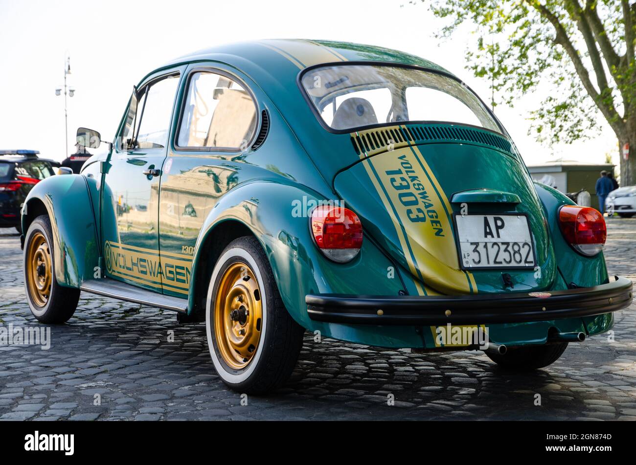 Rome, Italy. April 2021. Volkswagen Beetle 1303 green color. Iconic symbol of a generation. The Beetle is the best known German car in the world Stock Photo