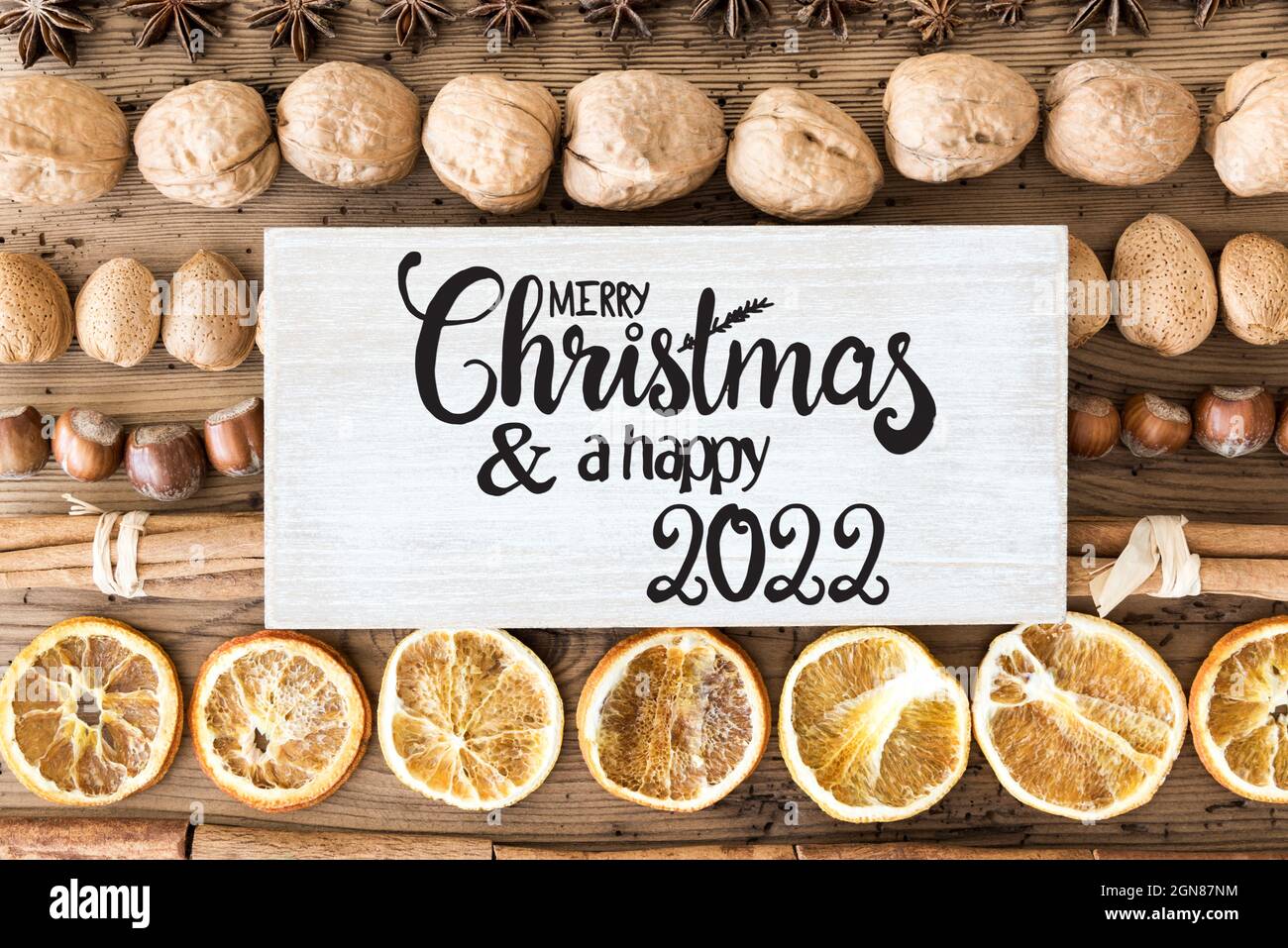 Christmas Food 2022 Sign With English Text Merry Christmas And Happy 2022. Christmas Food Flat  Lay With Walnut, Hazelnut, Cinnamon Sticks And Orange Peel Stock Photo -  Alamy