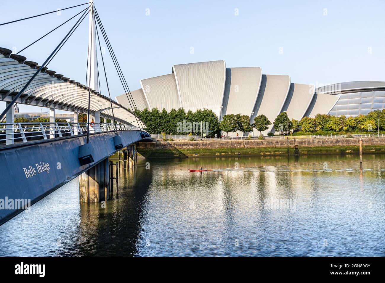 A canoeist about to pass under Bells Bridge on the River Clyde in front ...