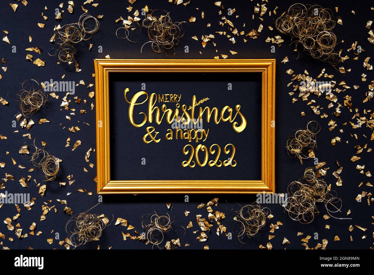 Frame, Golden Glitter Christmas Decoration, Merry Christmas And A Happy 2022 Stock Photo