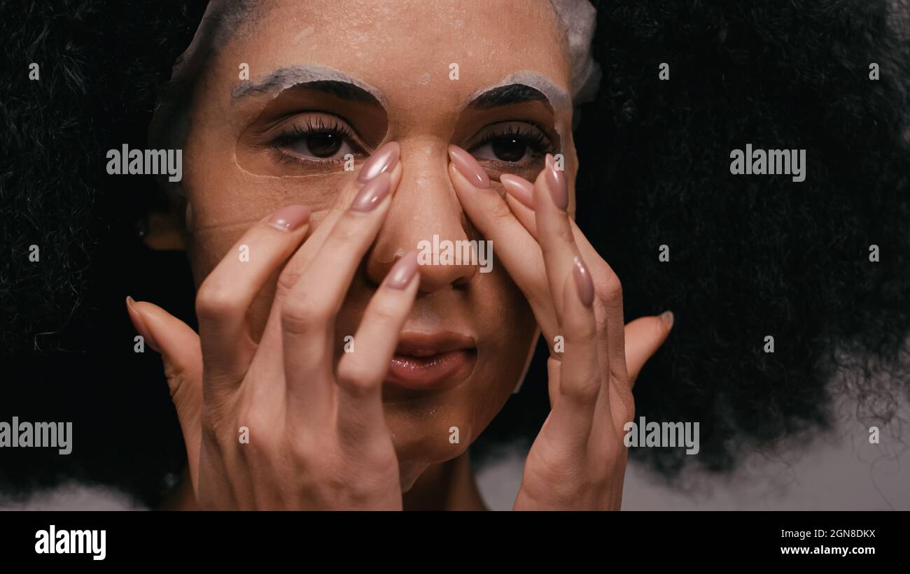 Black woman applying beauty mask hi-res stock photography and images ...