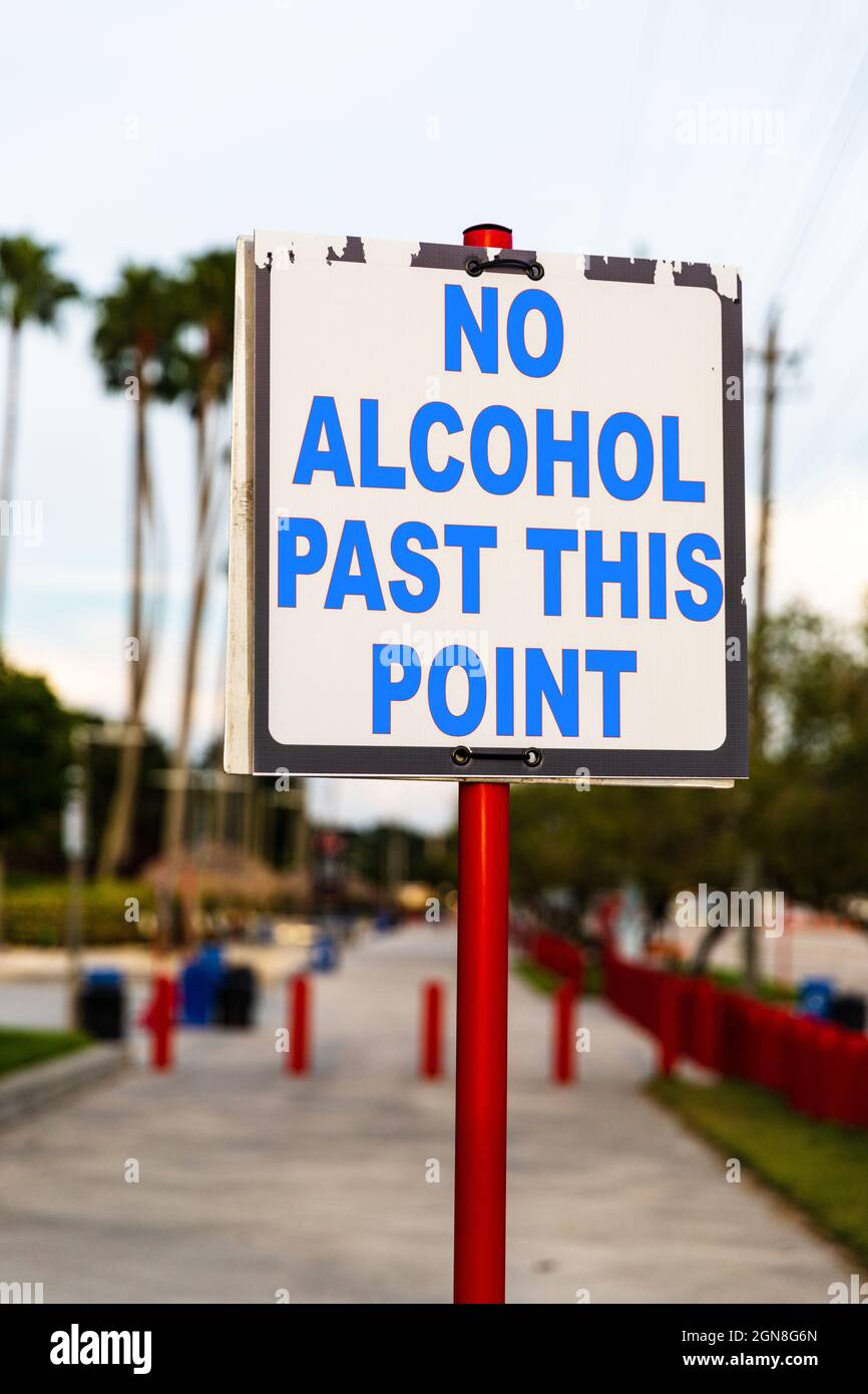 No Alcohol Past this point sign in bright blue letters Stock Photo
