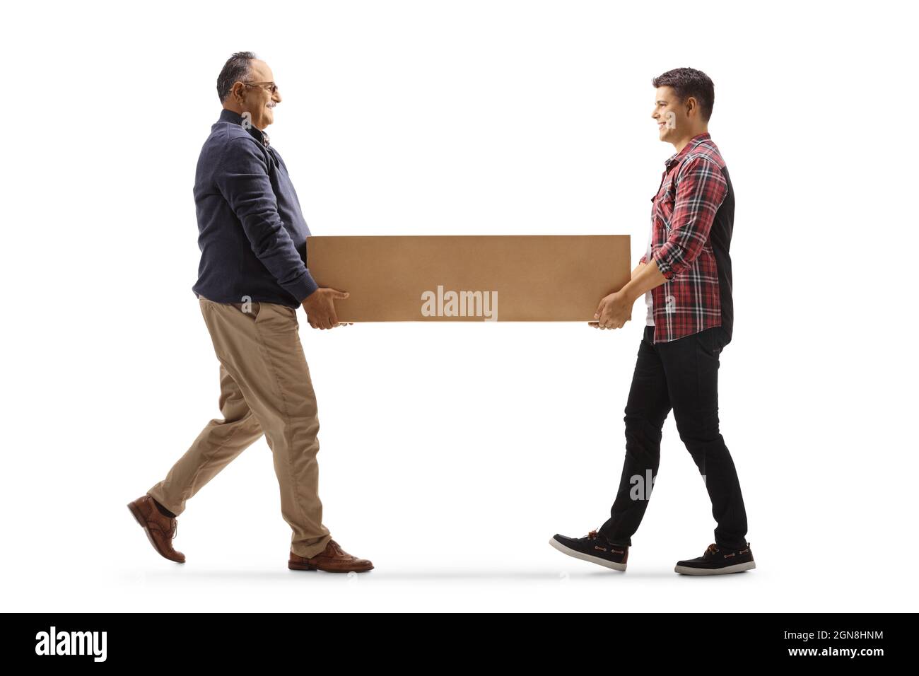 Father and son carrying a cardboard box isolated on white background Stock Photo