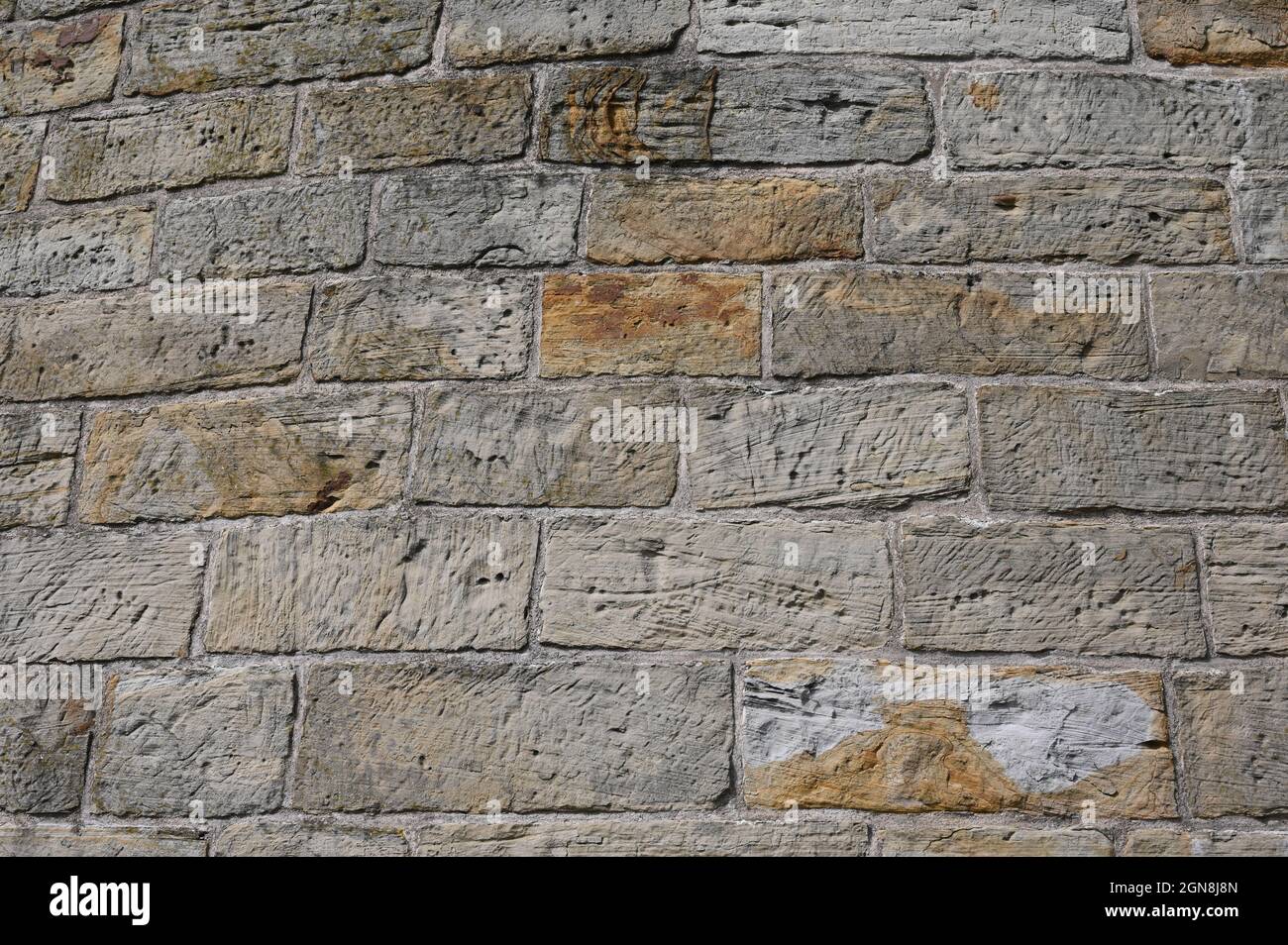Rustic wall made of sandstone blocks Stock Photo