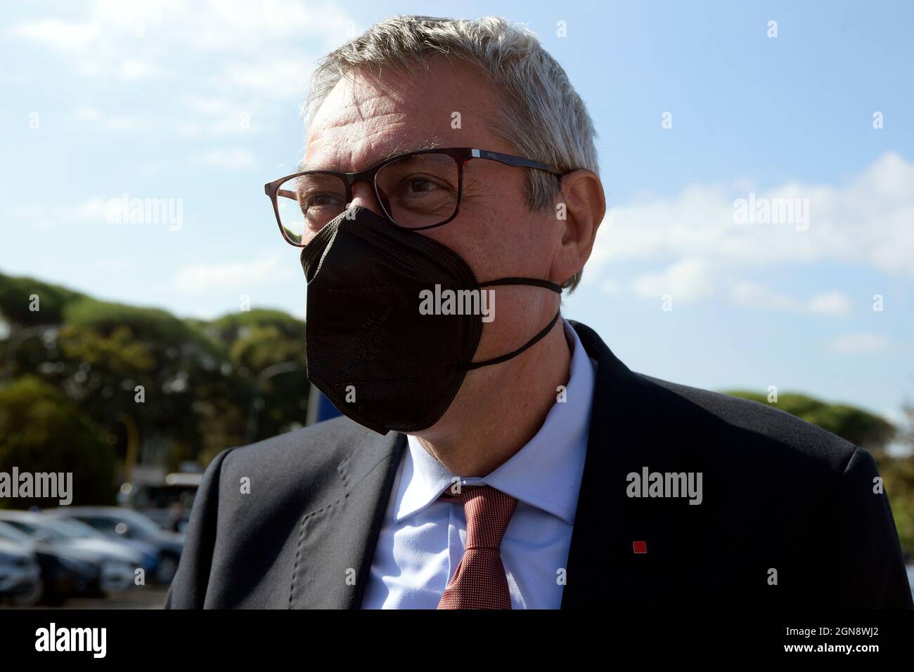 Rome, Italy. 23rd Sep, 2021. The general secretary of the CGIL trade union Maurizio Landini, wearing a protective anti Covid 19 mask, arrives at the annual conference of Confindustria, at the Palazzo dello Sport.Confindustria, is the Italian employers' federation and national chamber of commerce Credit: SOPA Images Limited/Alamy Live News Stock Photo