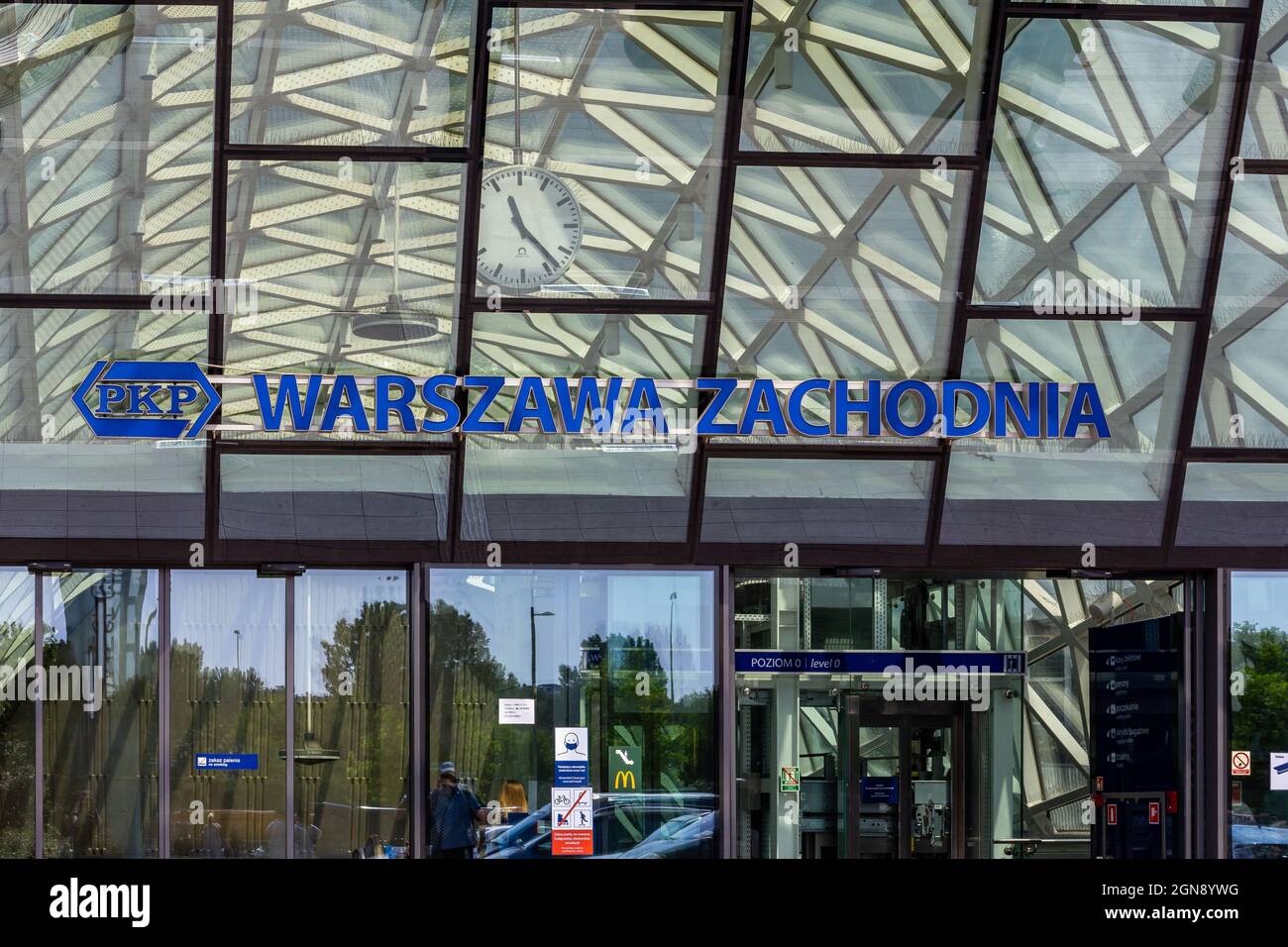 Warsaw, Poland, 09.07.2021. PKP Warszawa Zachodnia, Warsaw West train and bus station new modern glass building with PKP logo, entrance. Stock Photo