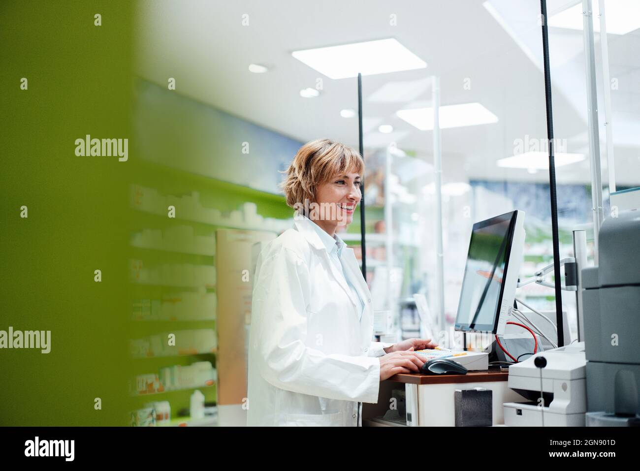 Pharmacist at her desk hi-res stock photography and images - Alamy