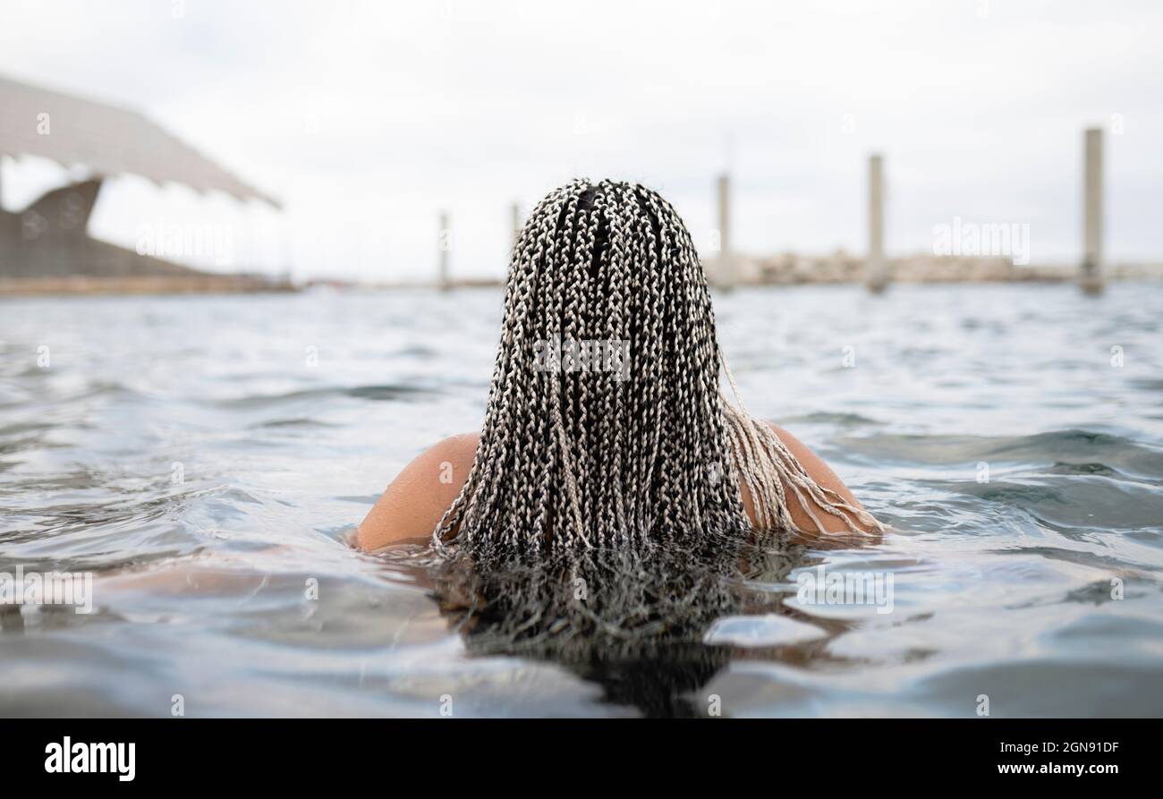 Braided hair rear view hi-res stock photography and images - Alamy