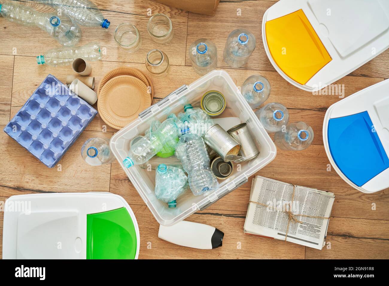 Garbage in recycling container with bins at home Stock Photo