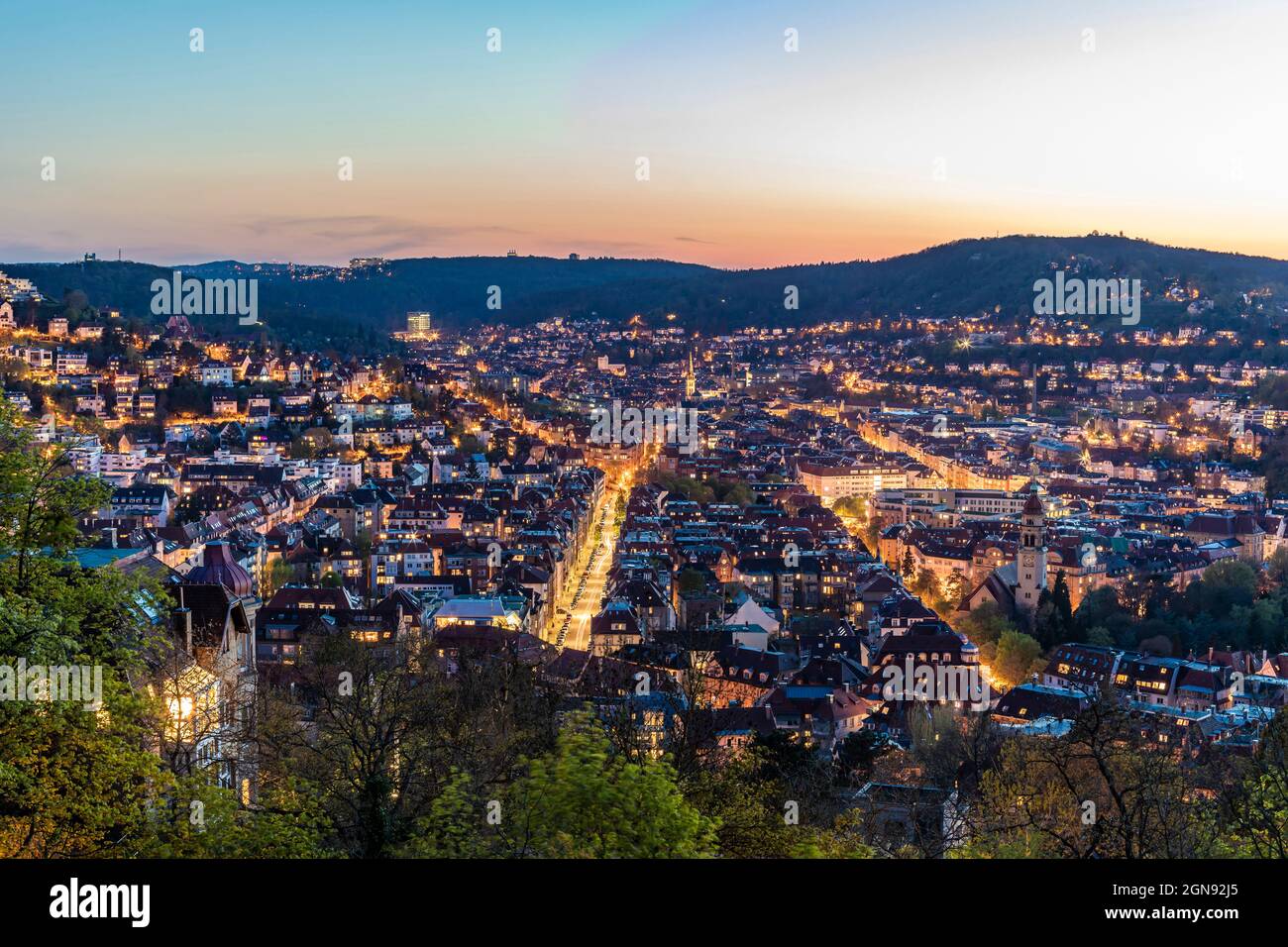Germany, Baden-Wurttemberg, Stuttgart, Heslach and Lehen districts seen from Weissenburgpark at dusk Stock Photo