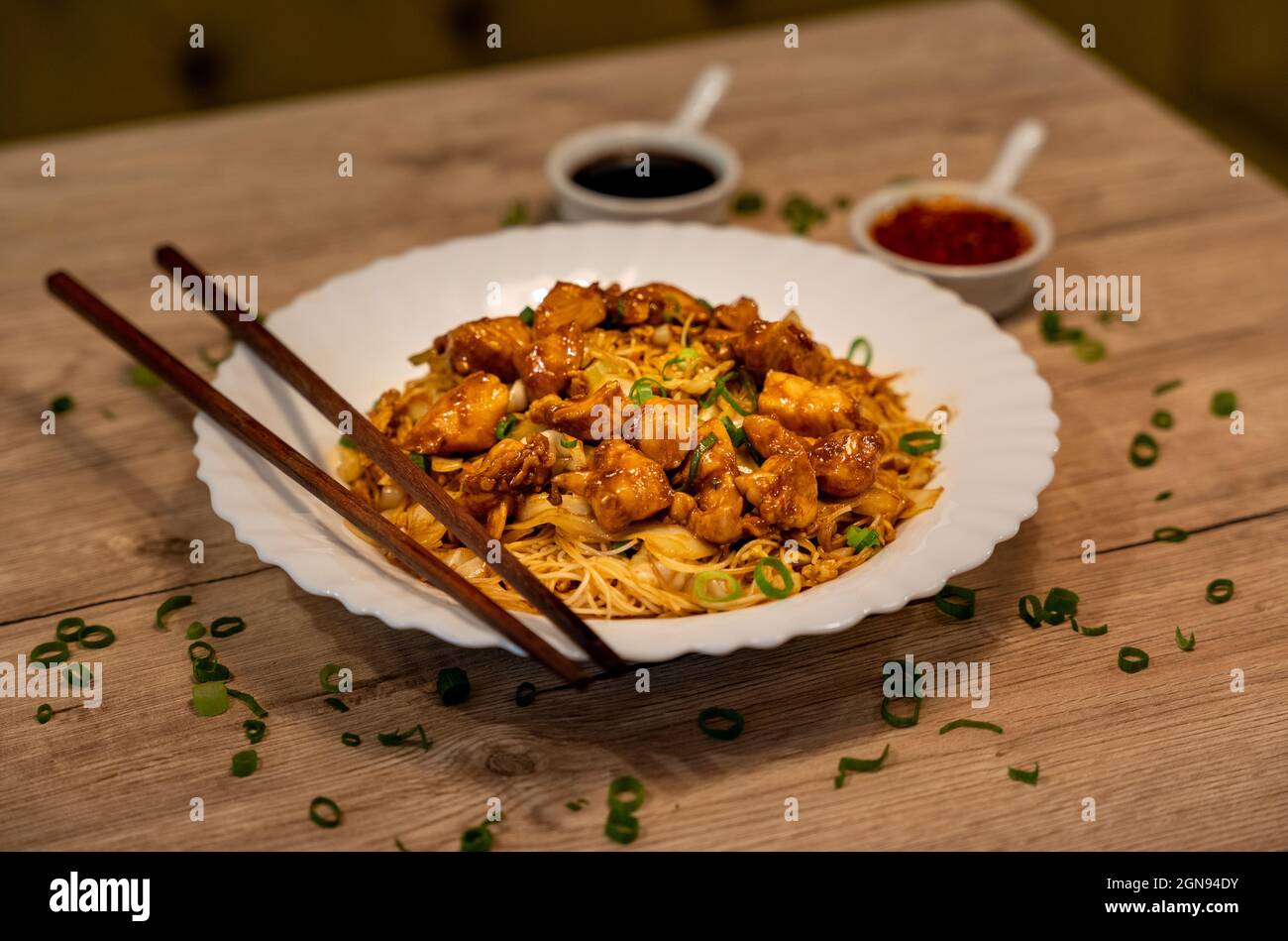 Fried rice noodles with chicken and vegetables Stock Photo - Alamy