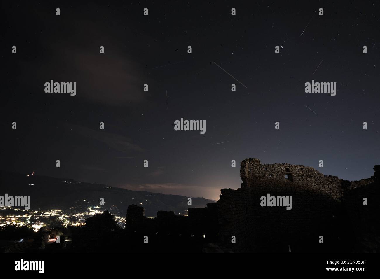 Meteor Shower Shooting star, Perseid on a summer night over a castle Stock Photo