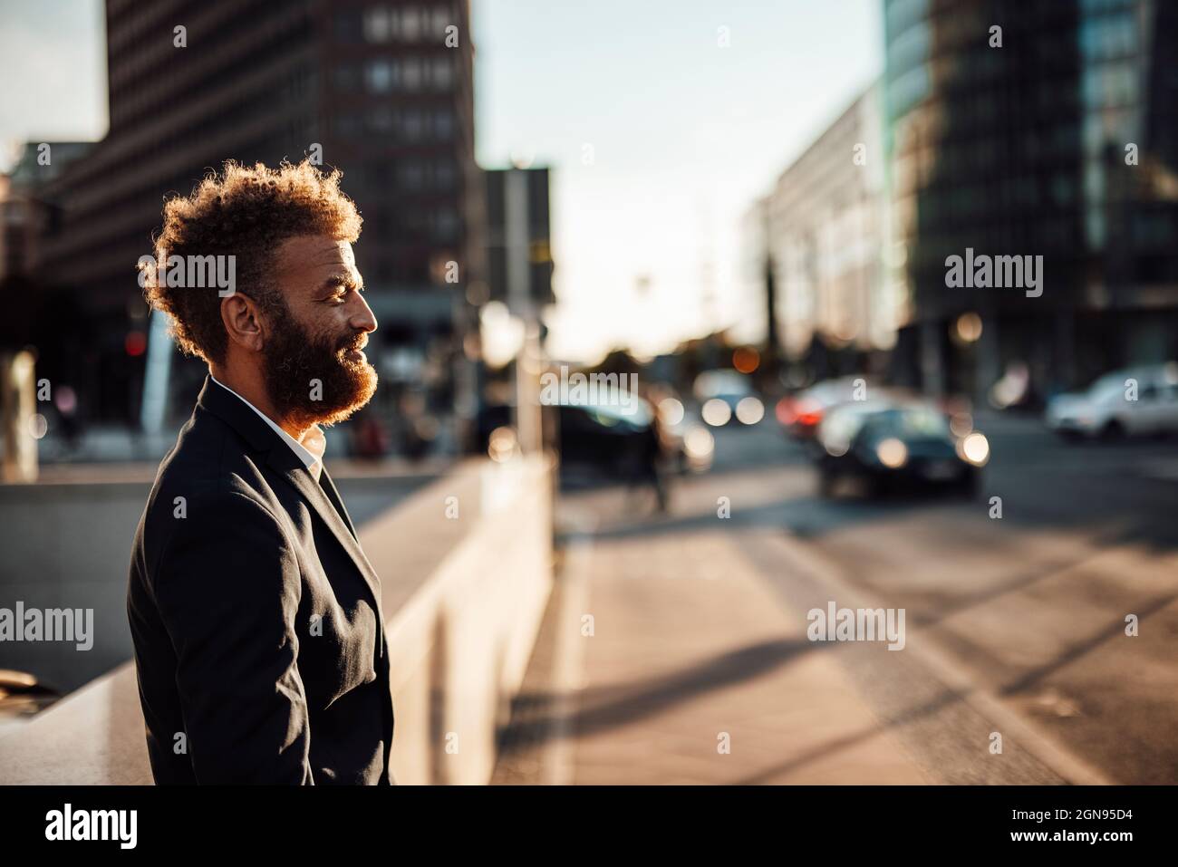 Mature male freelancer with brown hair in city Stock Photo