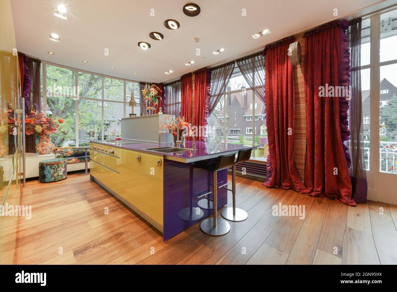 Image showcasing Colorful kitchen design of a modern apartment Stock Photo - Alamy