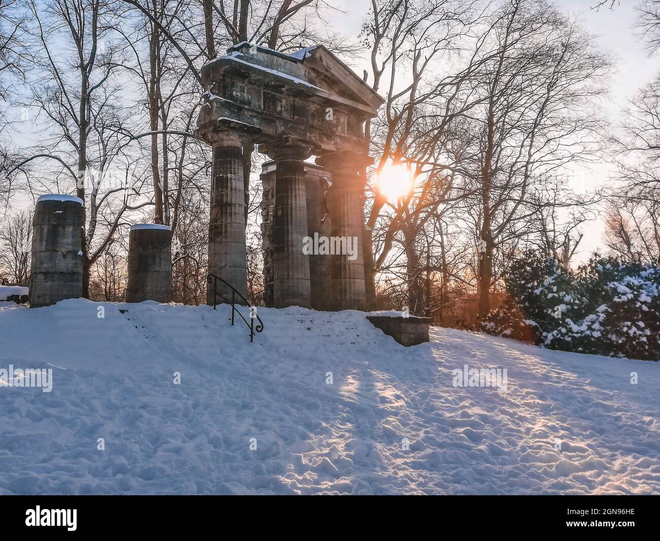 Portikus in Braunschweig. Historical building in city park. Snow covered landscape on a sunny day in Braunschweig, Germany Stock Photo