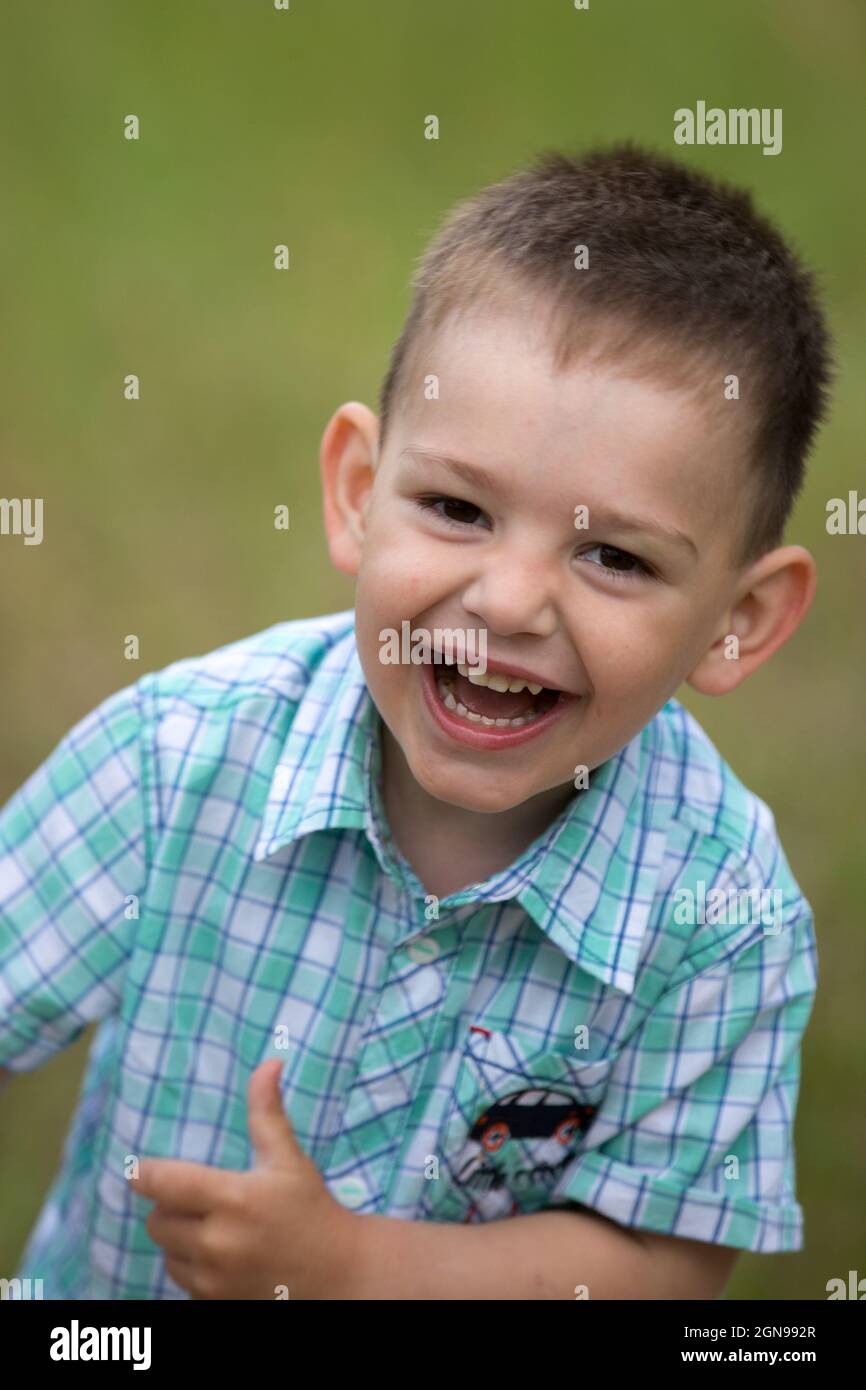 The Boy Runs And Laughs A Large Portrait Stock Photo Alamy the-boy-runs-and-laughs-a-large-portrait-stock-photo-alamy