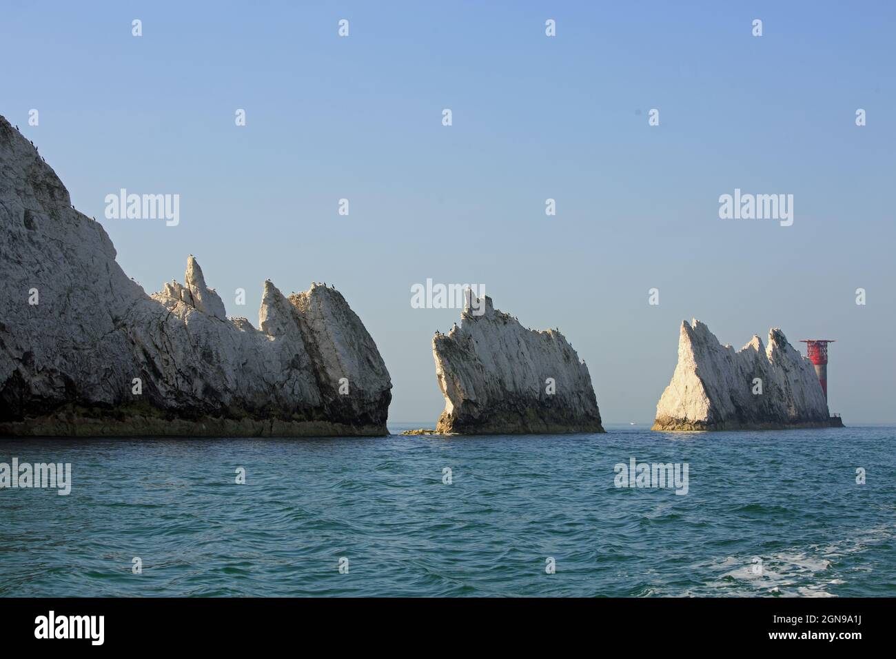 The Needles White Chalk Cliffs and Lighthouse on the Isle of Wight Stock Photo
