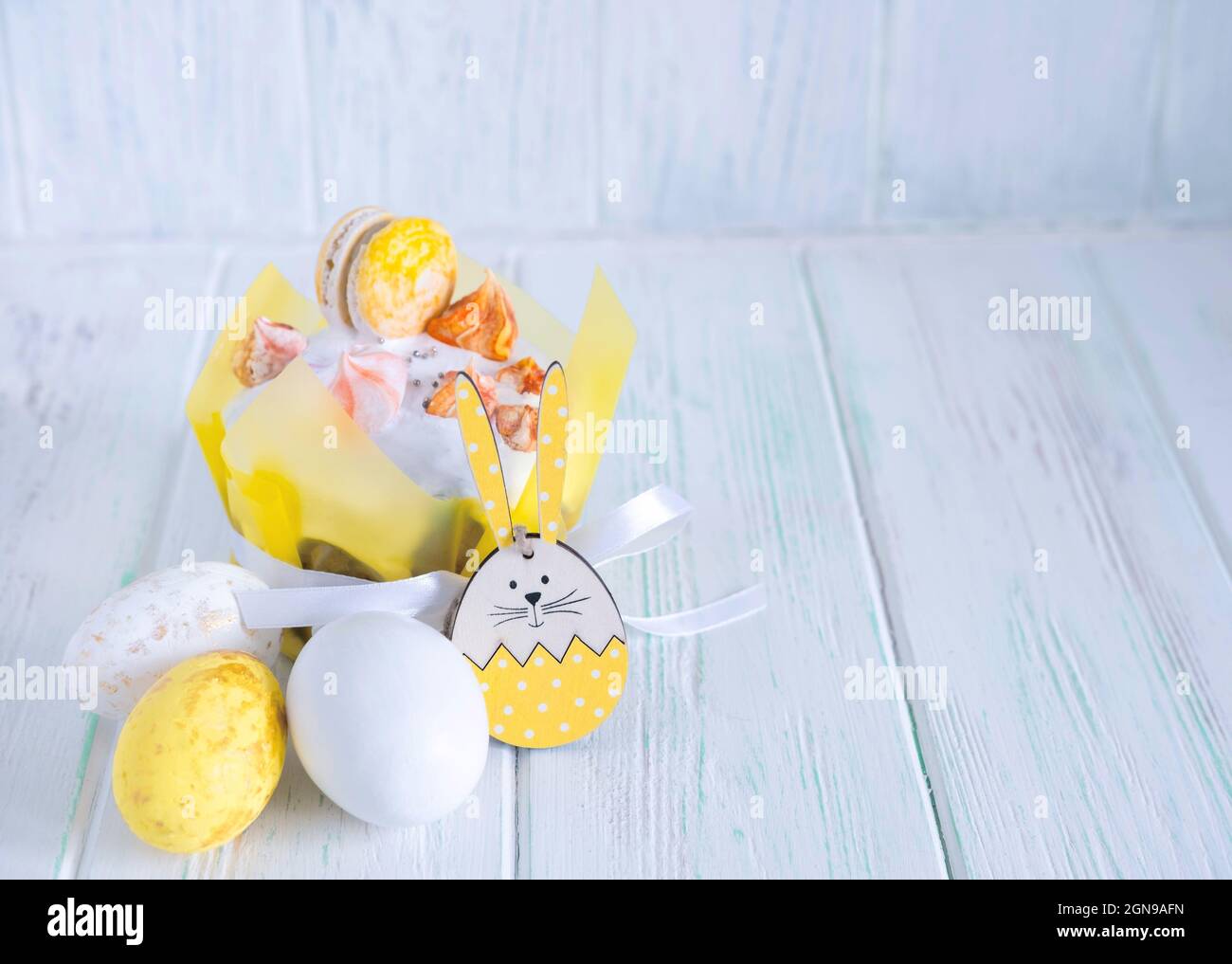 Easter cake beautifully decorated with icing, Easter eggs, rabbit. Easter composition Stock Photo