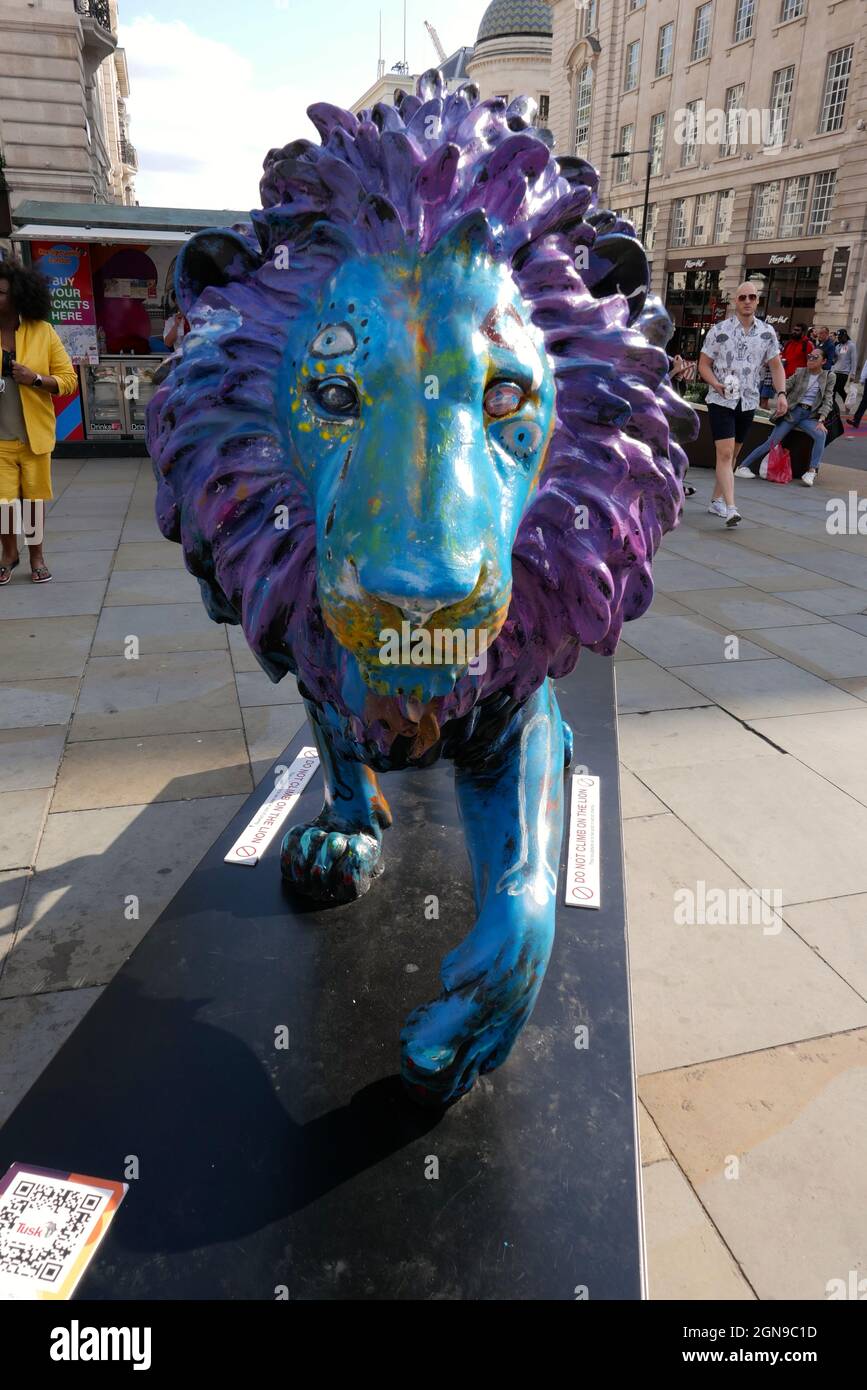 Life sized lion sculptures designed by celebrities including Ronnie Wood and Noel Fielding are on display in UK cities . London ,Bristol and Edinburgh are holting sculptures to raise awarness about threats to lions in the wild . The Tusk Lion Trail has been set up by UK conservation charity Tusk , which has the Duke of Cambridge as it's patron . 47 sculptures have been placed on streets in cities around the world . Other celebrities who took part in creating the pieces include British actors John Cleese and Mathew Horne and  the Dire Straits bassist John Illsley . Stock Photo