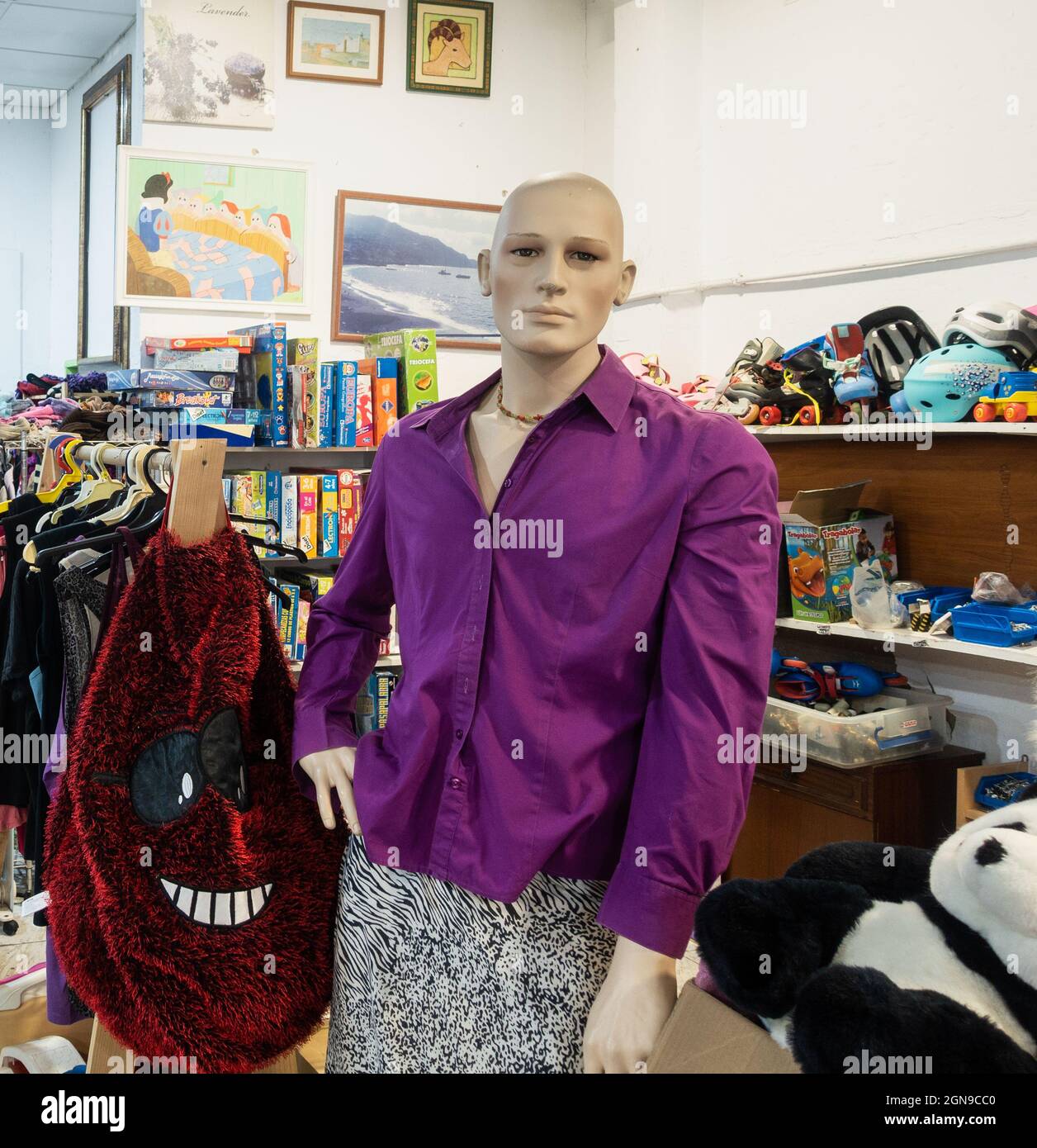 Charity shop selling clothes, toys and electrical items in Spain Stock
