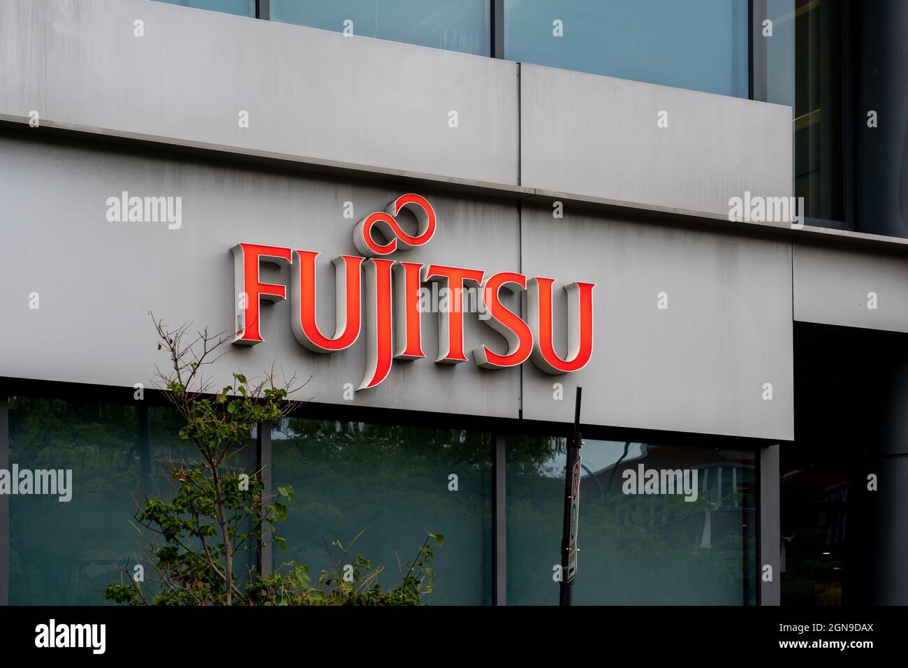 Montreal, QC, Canada - September 6, 2021: Close up of Fujitsu sign on their office building in Montreal, QC, Canada. Stock Photo