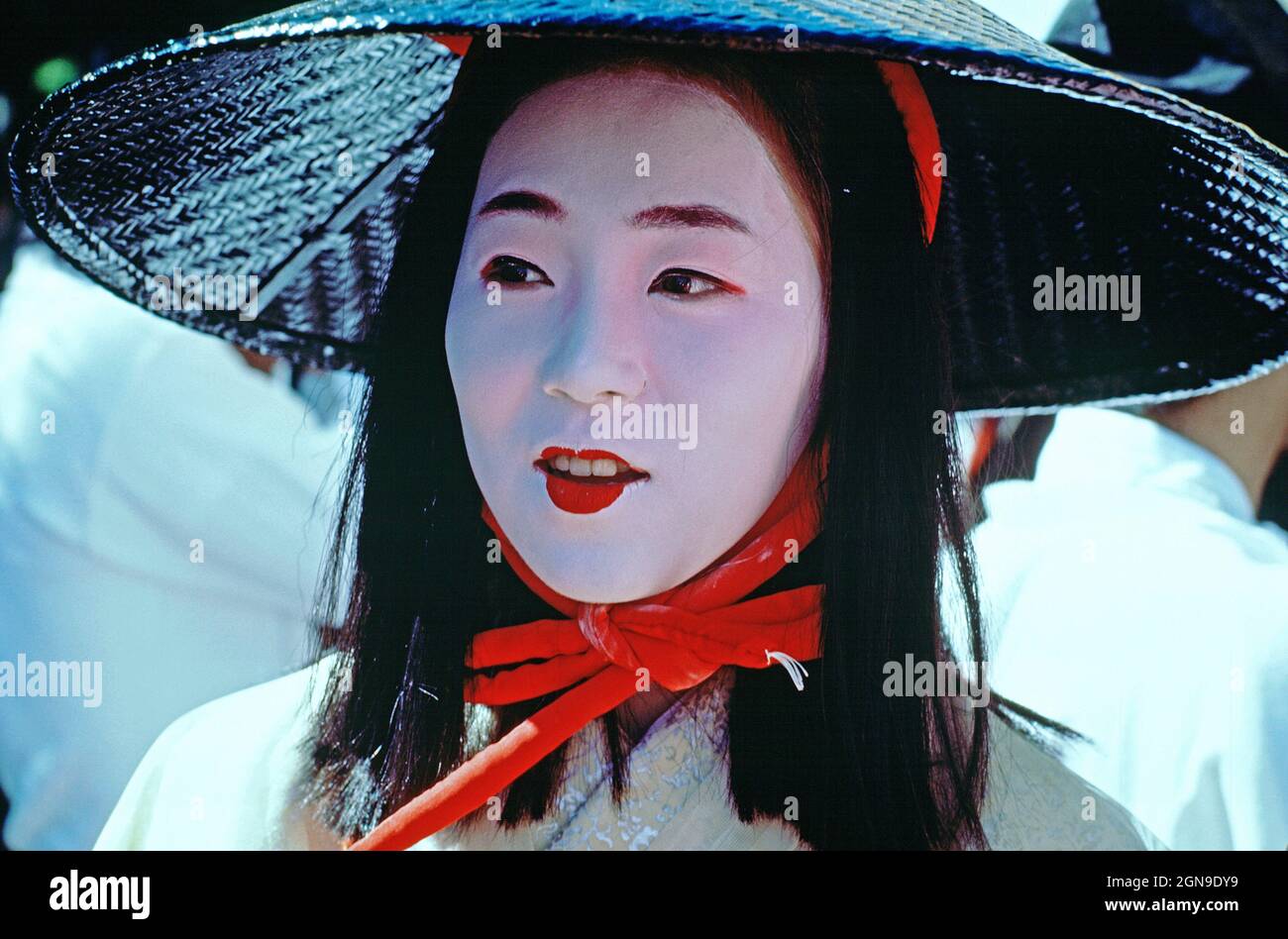 Japan. Kyoto. Imperial Palace. Woman in Heian period costume with traditional white face makeup. Stock Photo