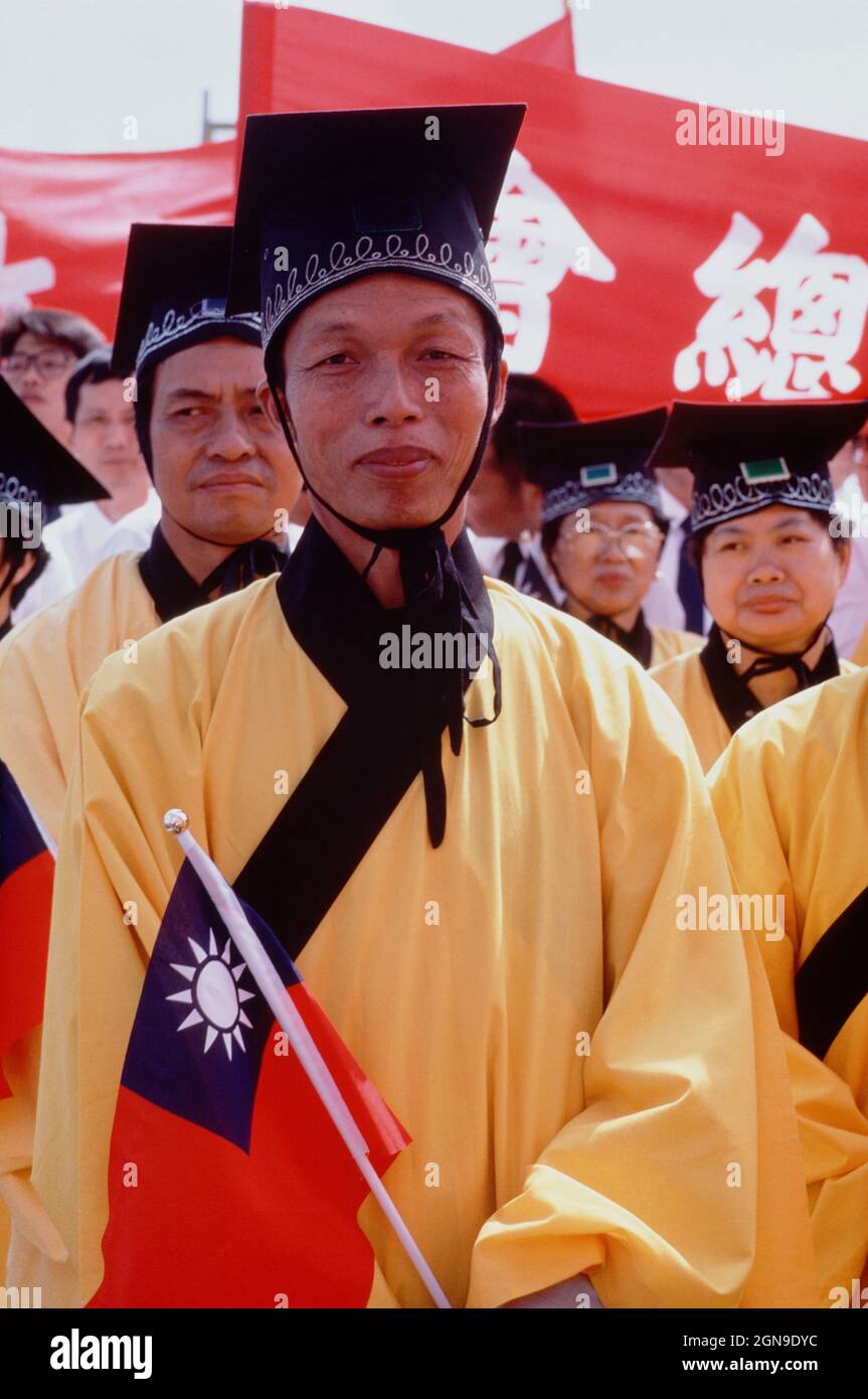 Taiwan. Taipei. National Day parade. Men in yellow robes. Confucian ceremony. Stock Photo