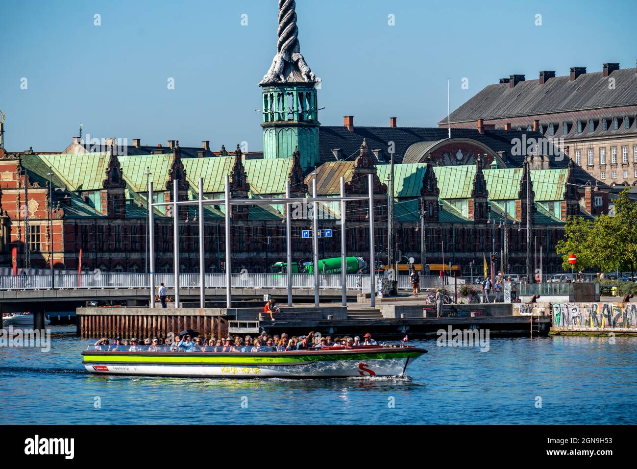 Former stock exchange building, harbour, canal cruise boat, Copenhagen, Denmark, Stock Photo