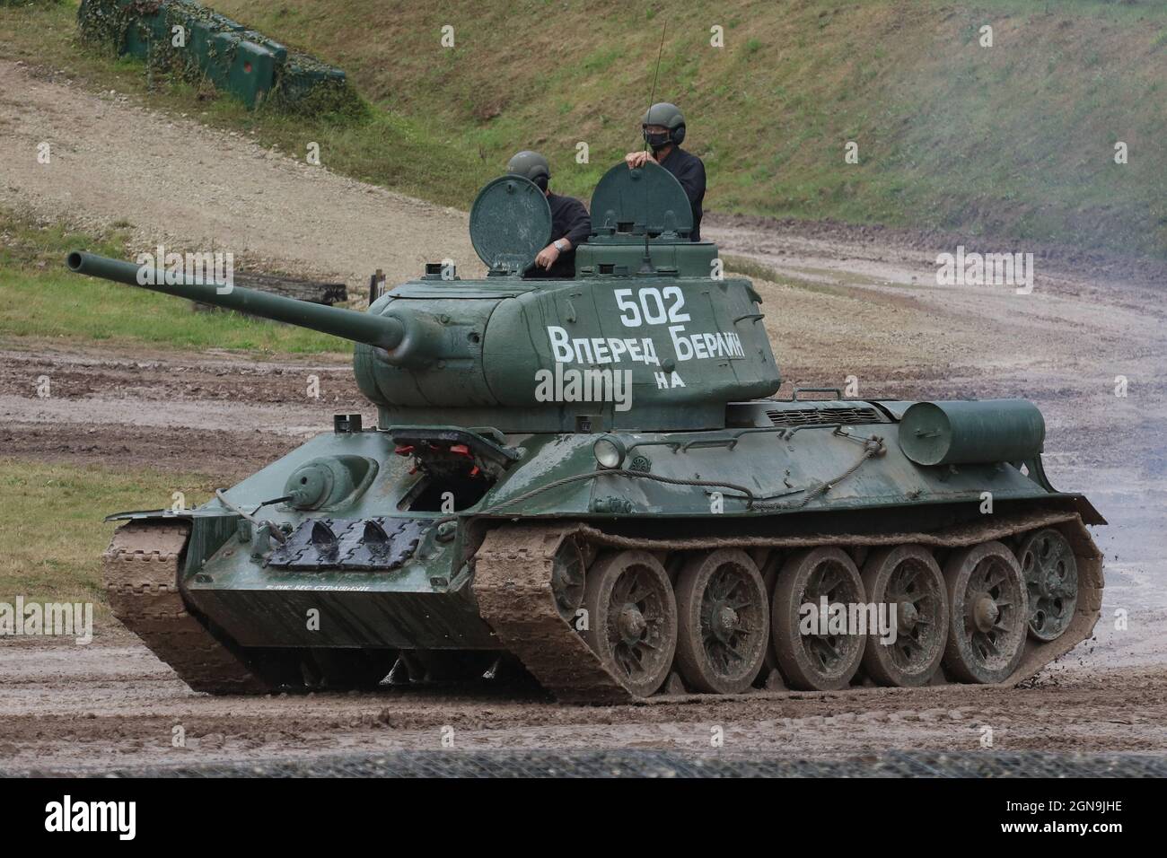 Russian T34 tank. A Russian T34/85 tank during a demonstration at Bovington Tank Museum, Dorset, UK Stock Photo