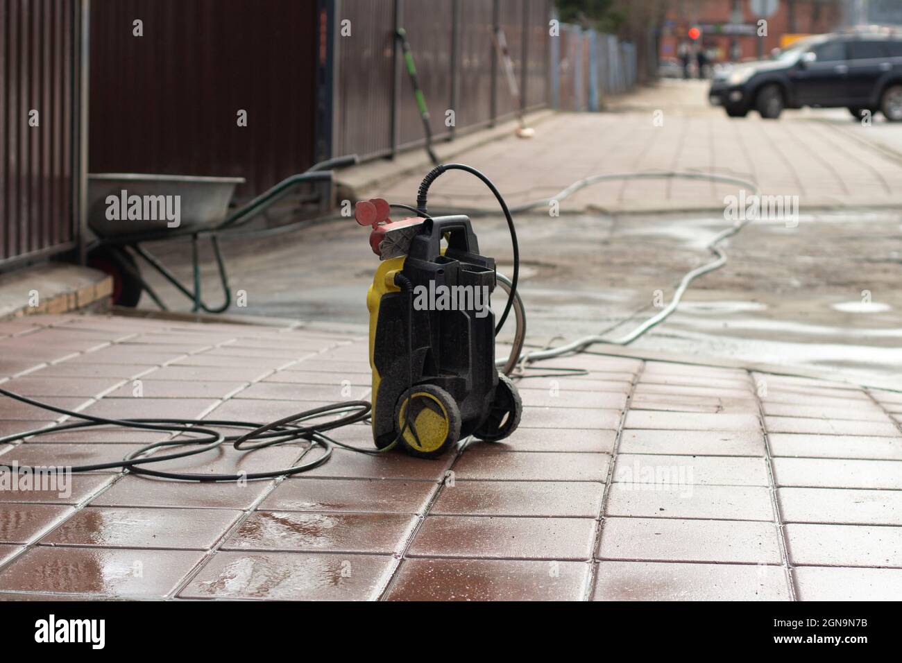 A water washing machine. Gardener's tool. Cleaning the area with water
