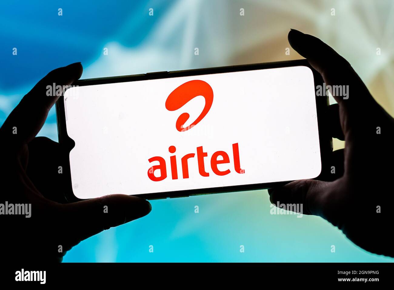 In this photo illustration an Airtel logo seen displayed on a smartphone. Stock Photo