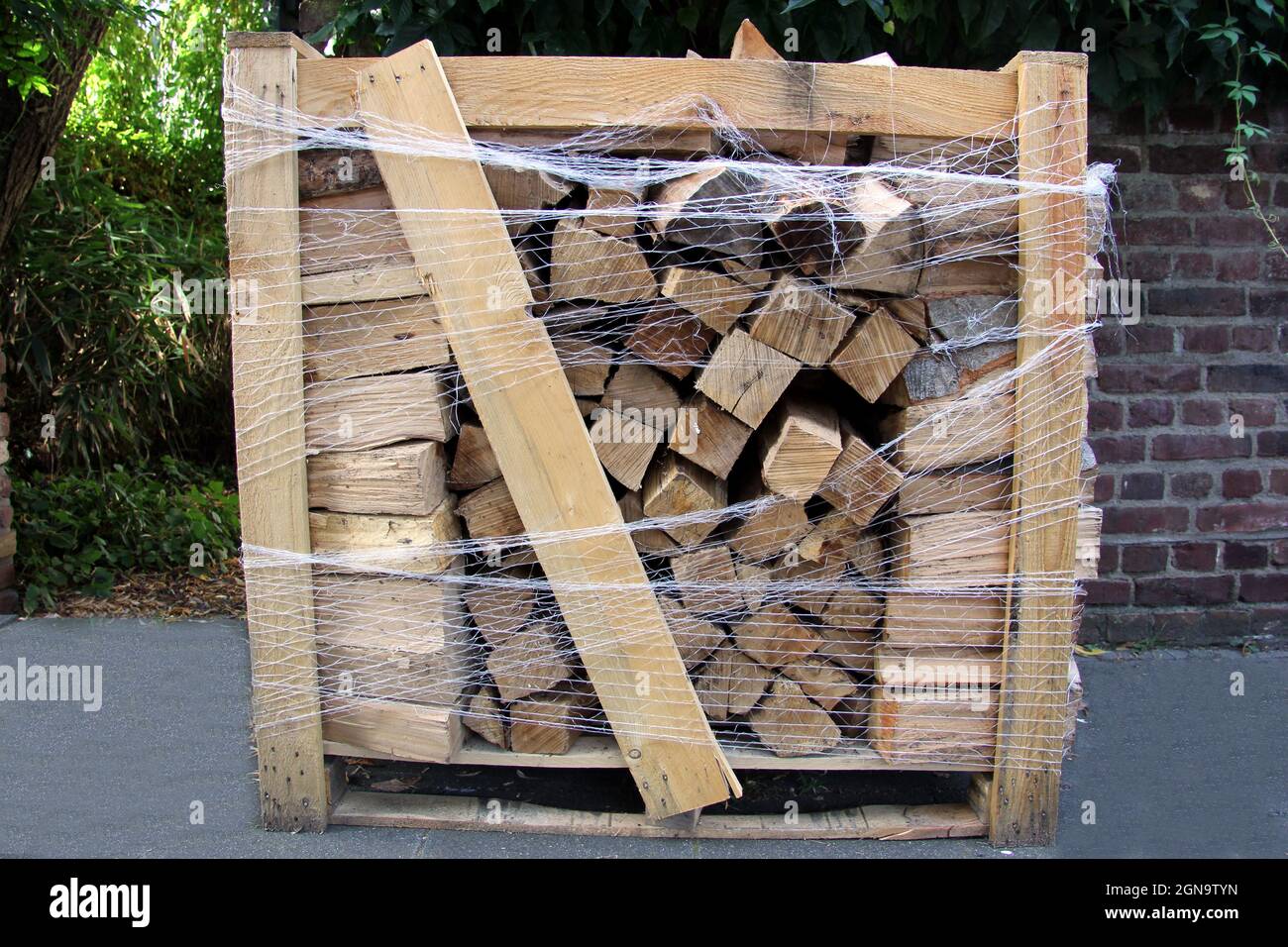 cubic meter of firewood, container for wood, transportation of firing wood  Stock Photo - Alamy