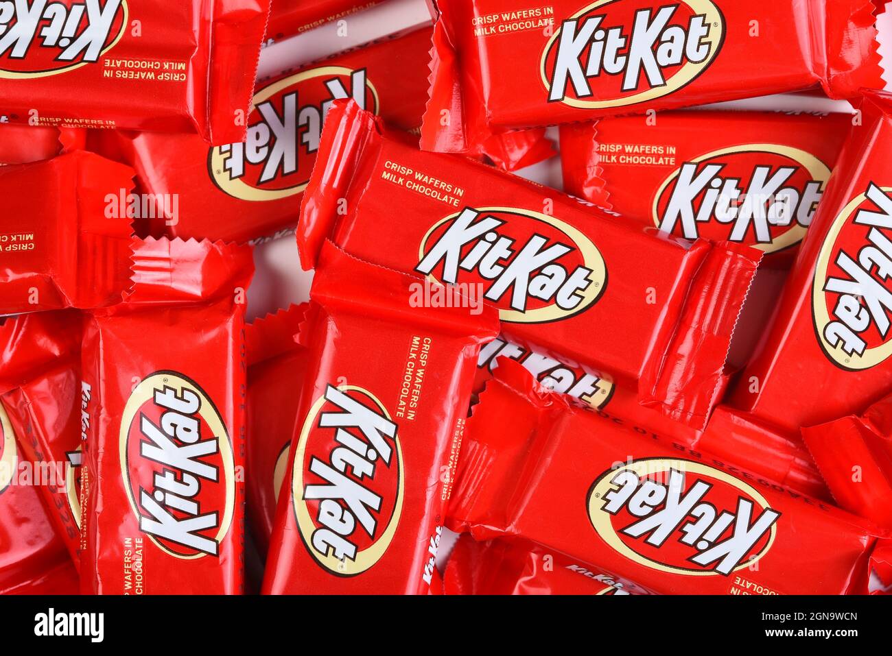 IRVINE, CALIFORNIA - 23 SEPT 2021: A large pile of  Kit Kat Fun Size Candy Bars for Halloween. Stock Photo