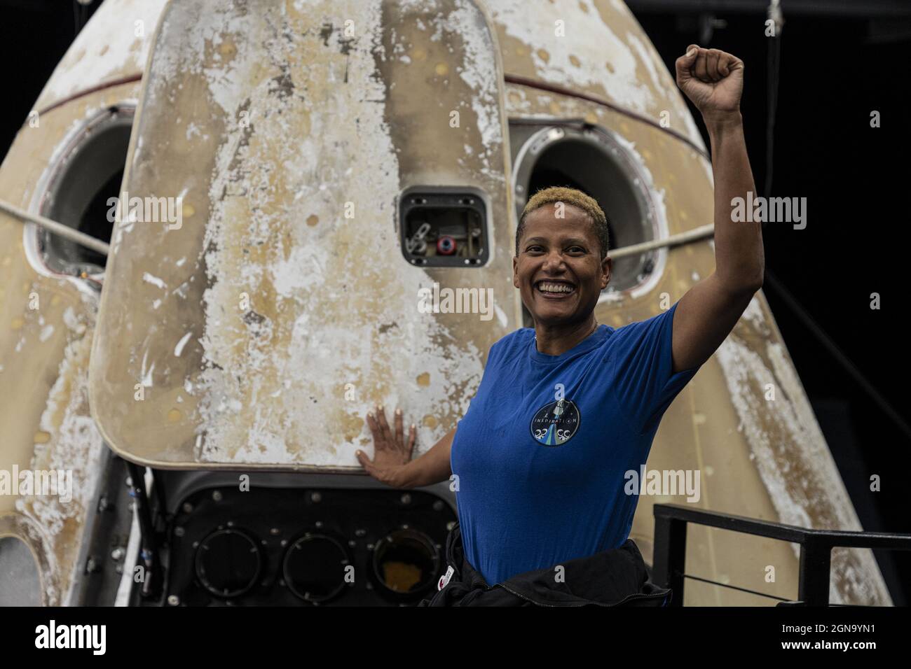 Dr. Sian Proctor poses with Crew Dragon Resilience after Inspiration4, the world's first all-civilian mission to space, safely returned to Earth on September 18, 2021, following their groundbreaking three-day mission. Jared Isaacman, Hayley Arceneaux, Christopher Sembroski, and Dr. Sian Proctor launched into space onboard a SpaceX Dragon spacecraft on September 15. During that time, they performed several science experiments and video conferenced with individuals at Jude Children's Research Hospital. Photo by SpaceX/UPI Stock Photo