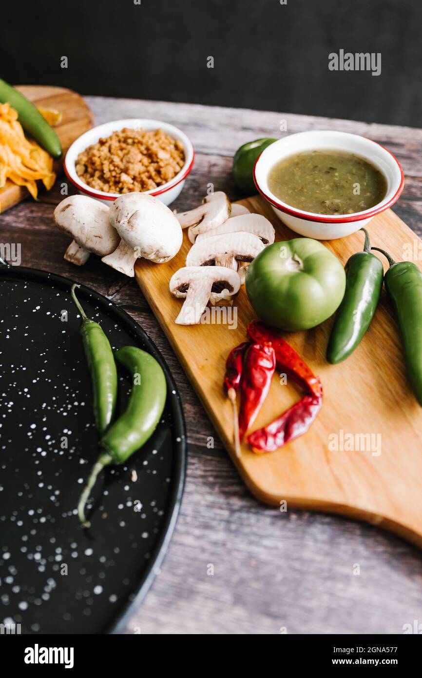 Mexican ingredients to prepare green sauce and traditional dishes in Mexico City Stock Photo