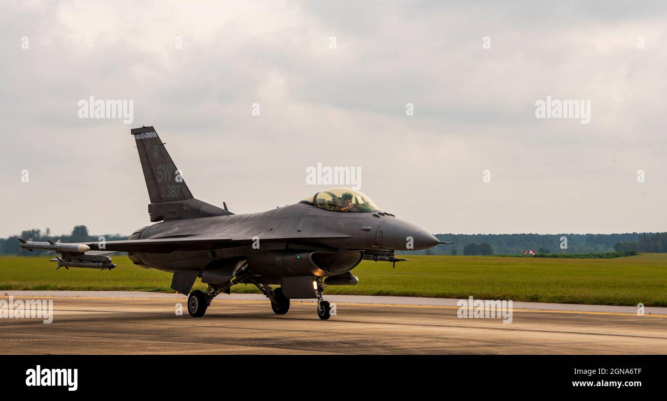 A U.S. Air Force pilot assigned to the 55th Fighter Squadron, taxis an ...