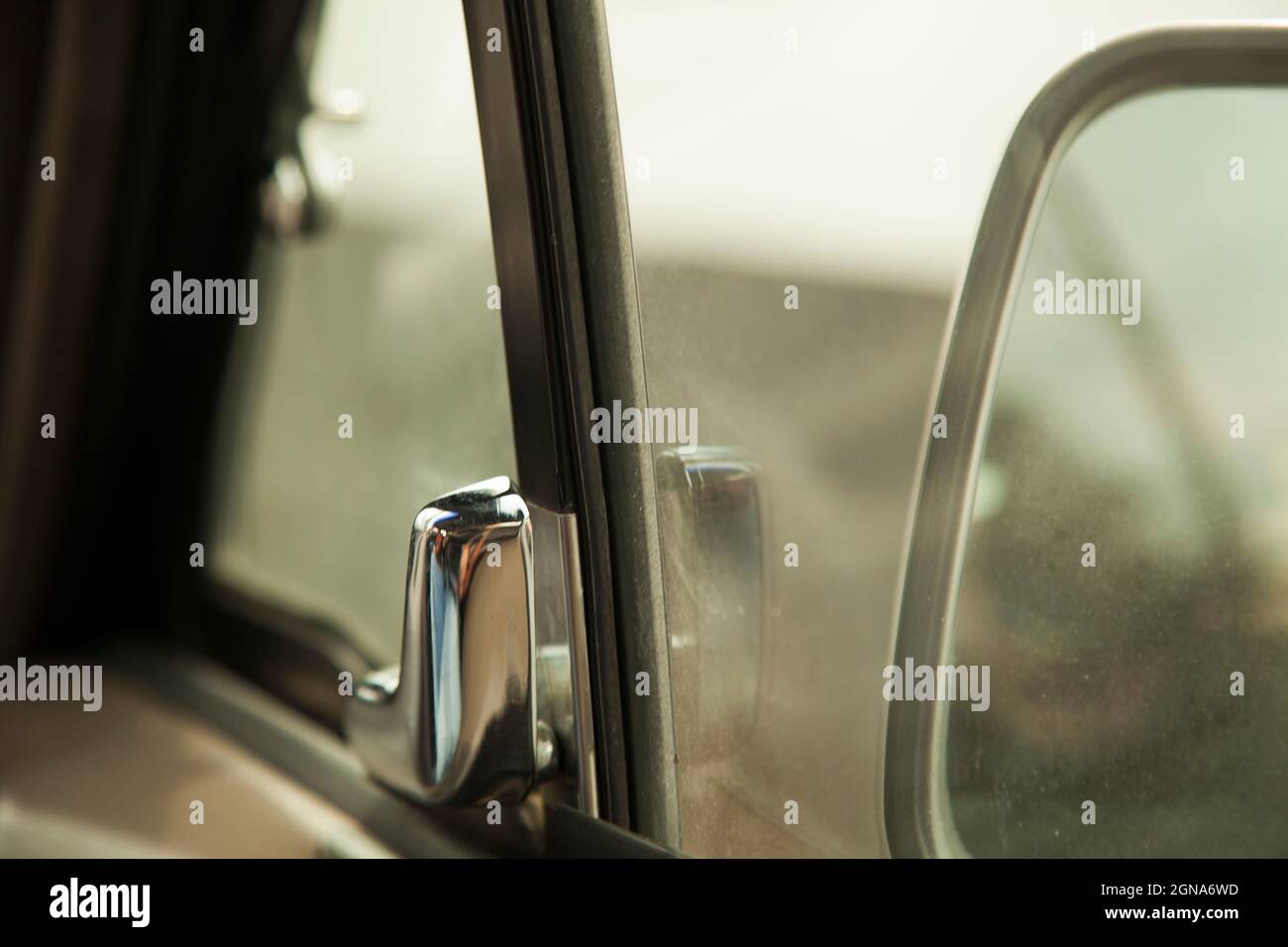 old vintage car window side mirror reflection classic automobile Stock Photo
