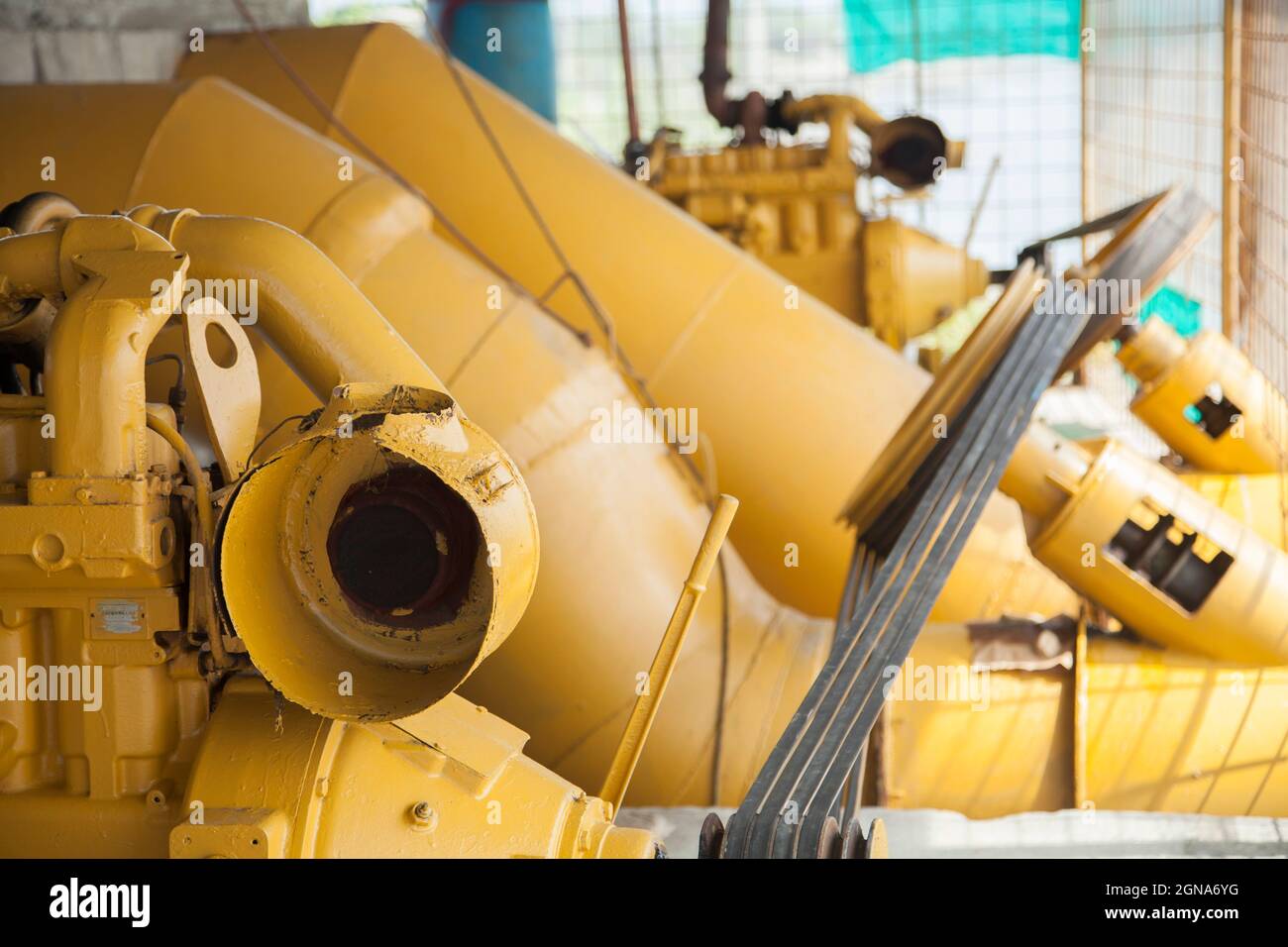 water pumping machinery yellow technology pumps big water Stock Photo