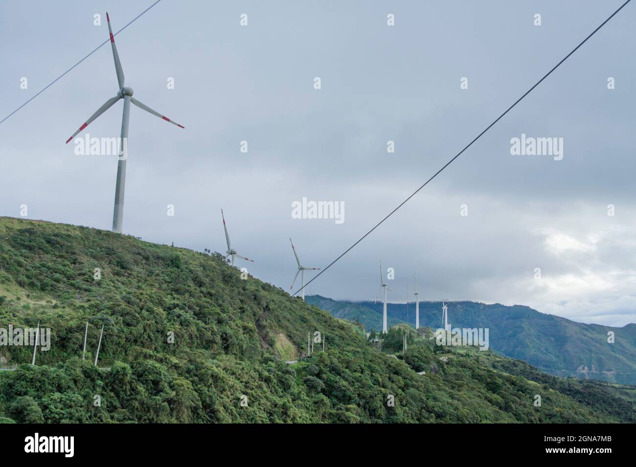 Wide photo of Modern electricity generating windmill in Loja, Ecuador