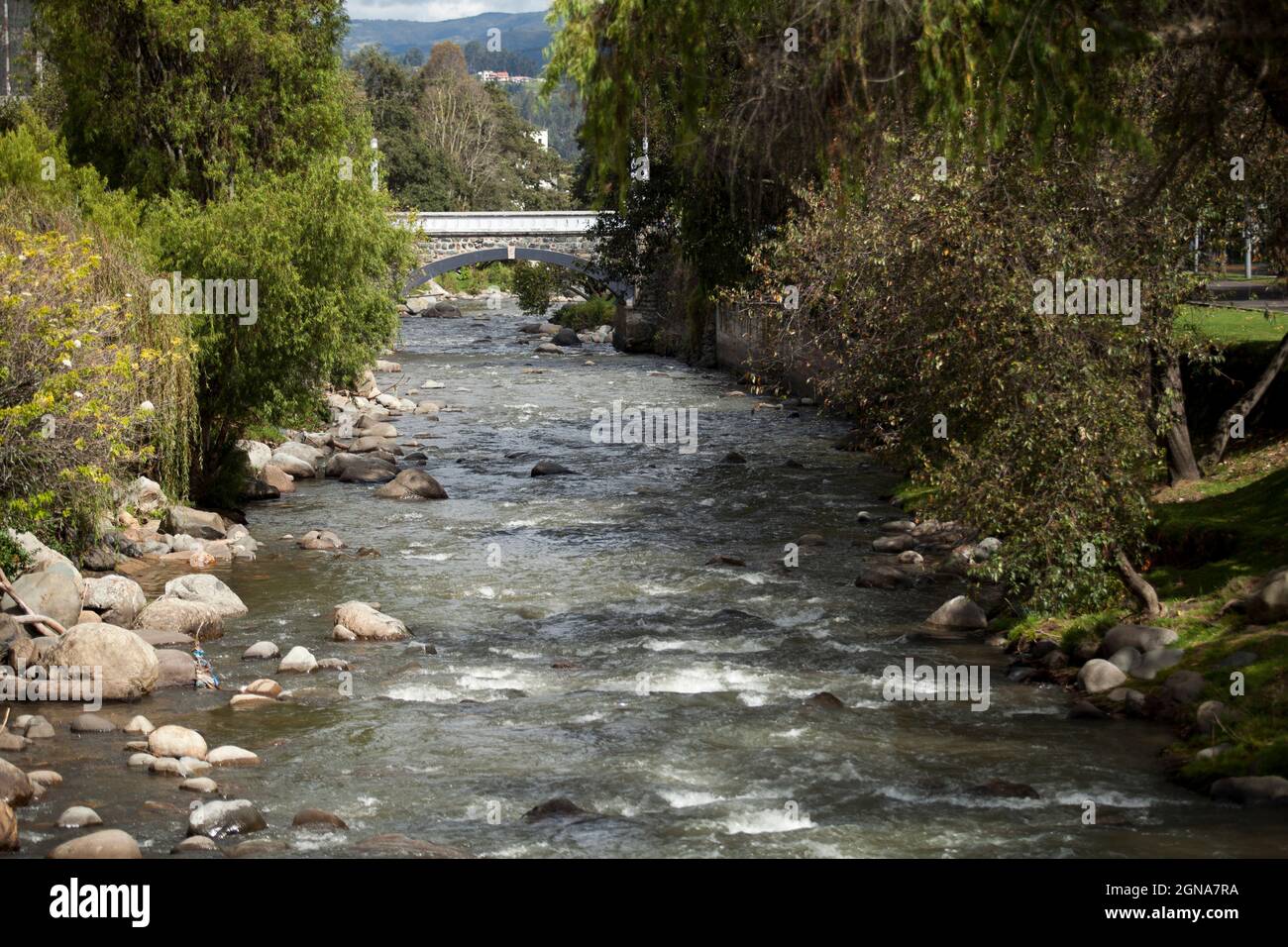 telephoto photo of bridge or a running river in cuenca, ecuador Stock Photo