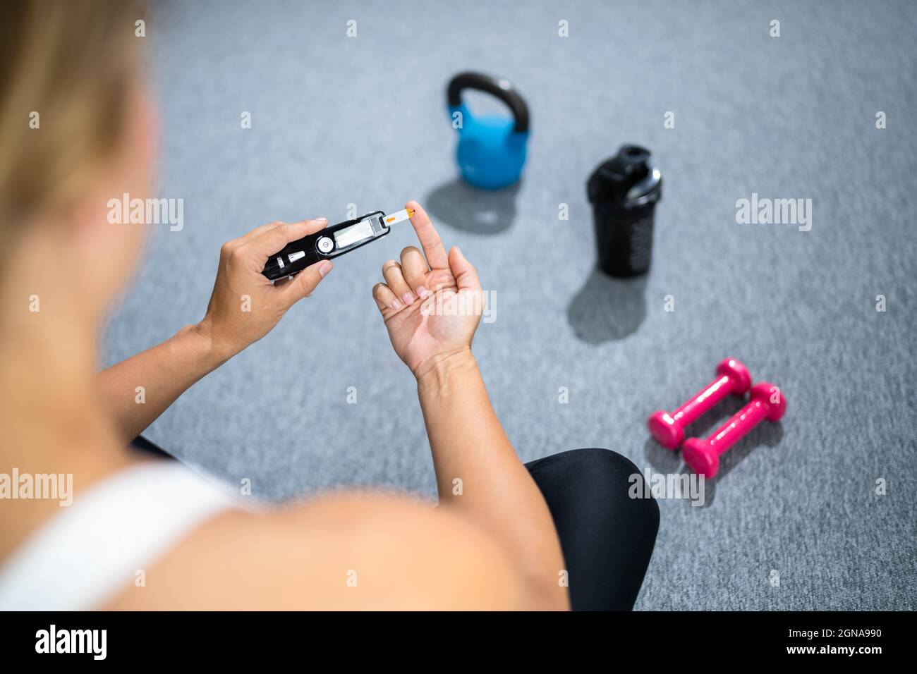 Diabetes And Sport. Healthy Lifestyle And Glucometer Stock Photo