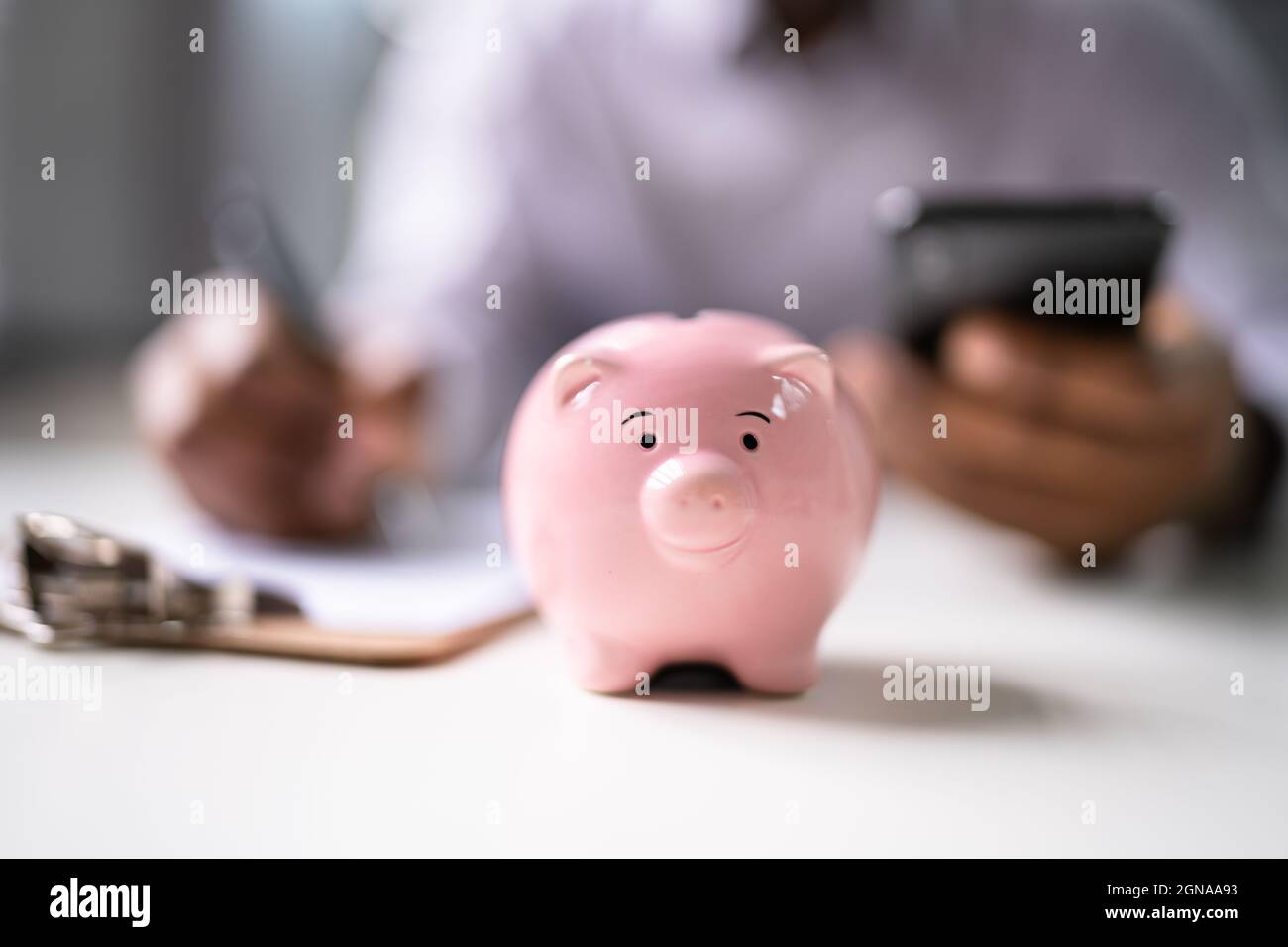 Financial Money Advice. Saving in 401K. Piggybank Deposit Stock Photo