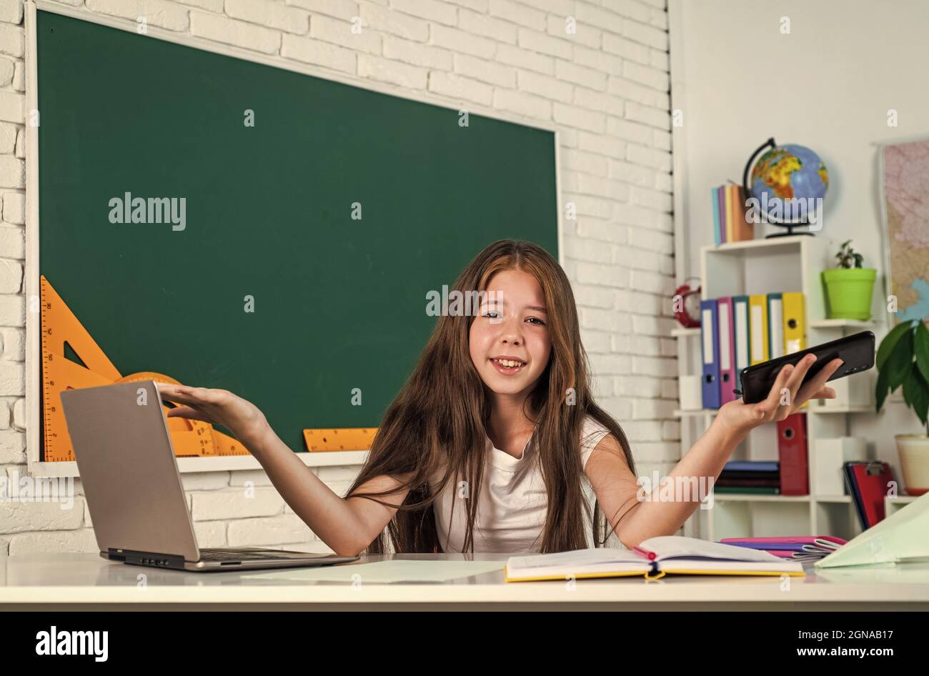 girl from elementary school in classroom, Education Stock Photo - Alamy