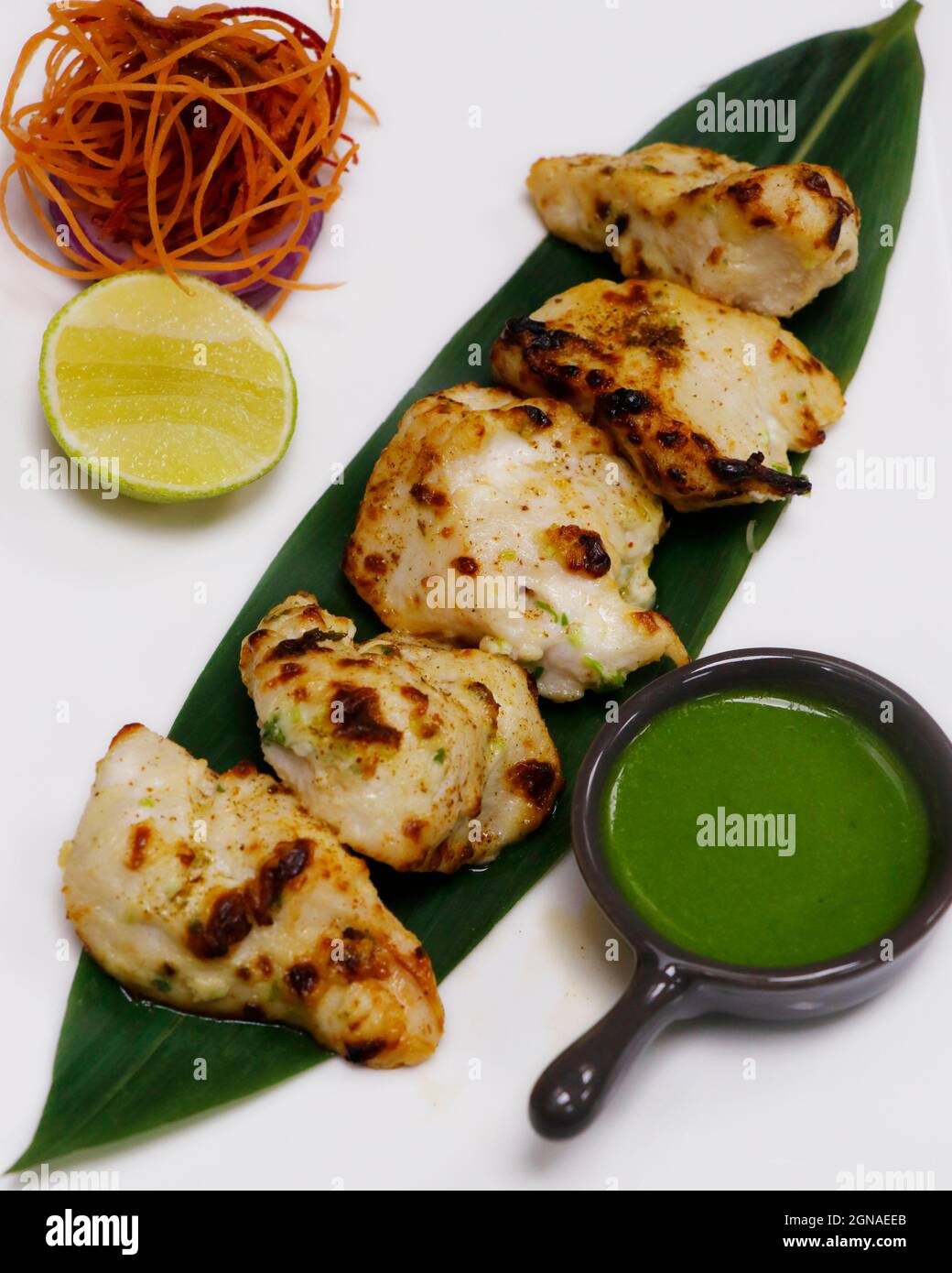 tandoori malai chicken tikka, cream based marinated chicken cubes