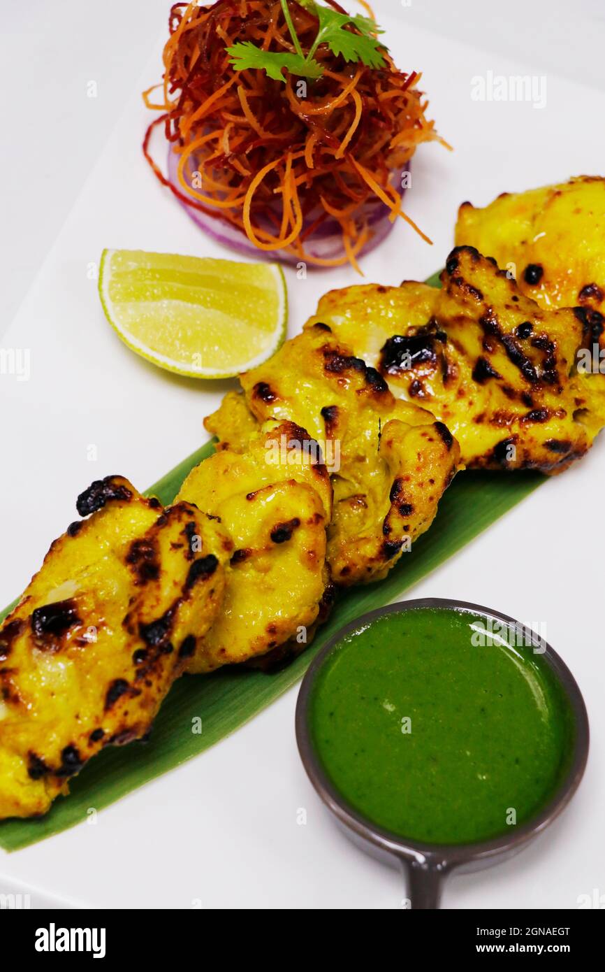 zafrani chicken tikka, saffron and yoghurt marinated spiced tandoori