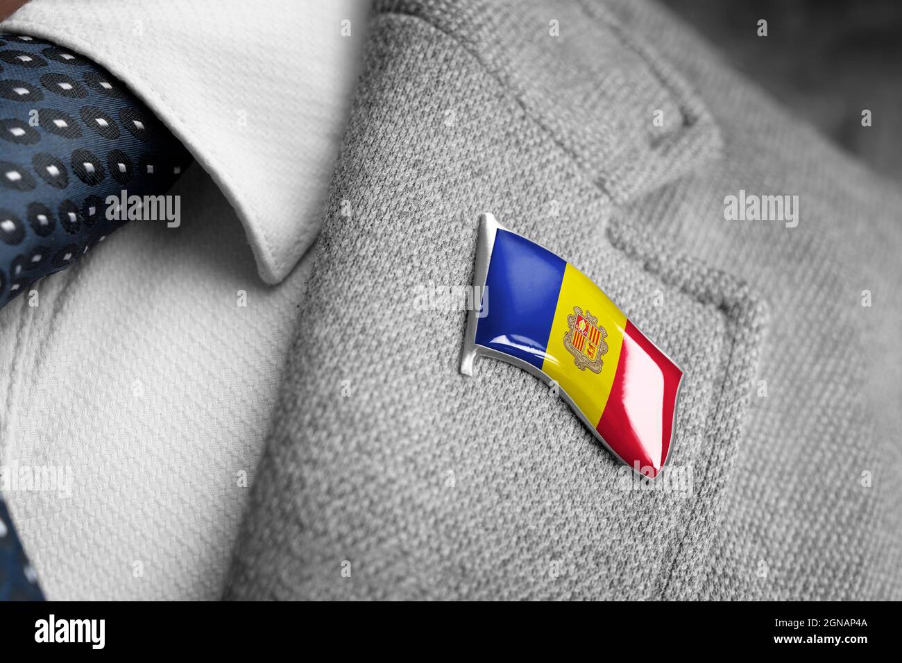 Metal badge with the flag of Andorra on a suit lapel Stock Photo
